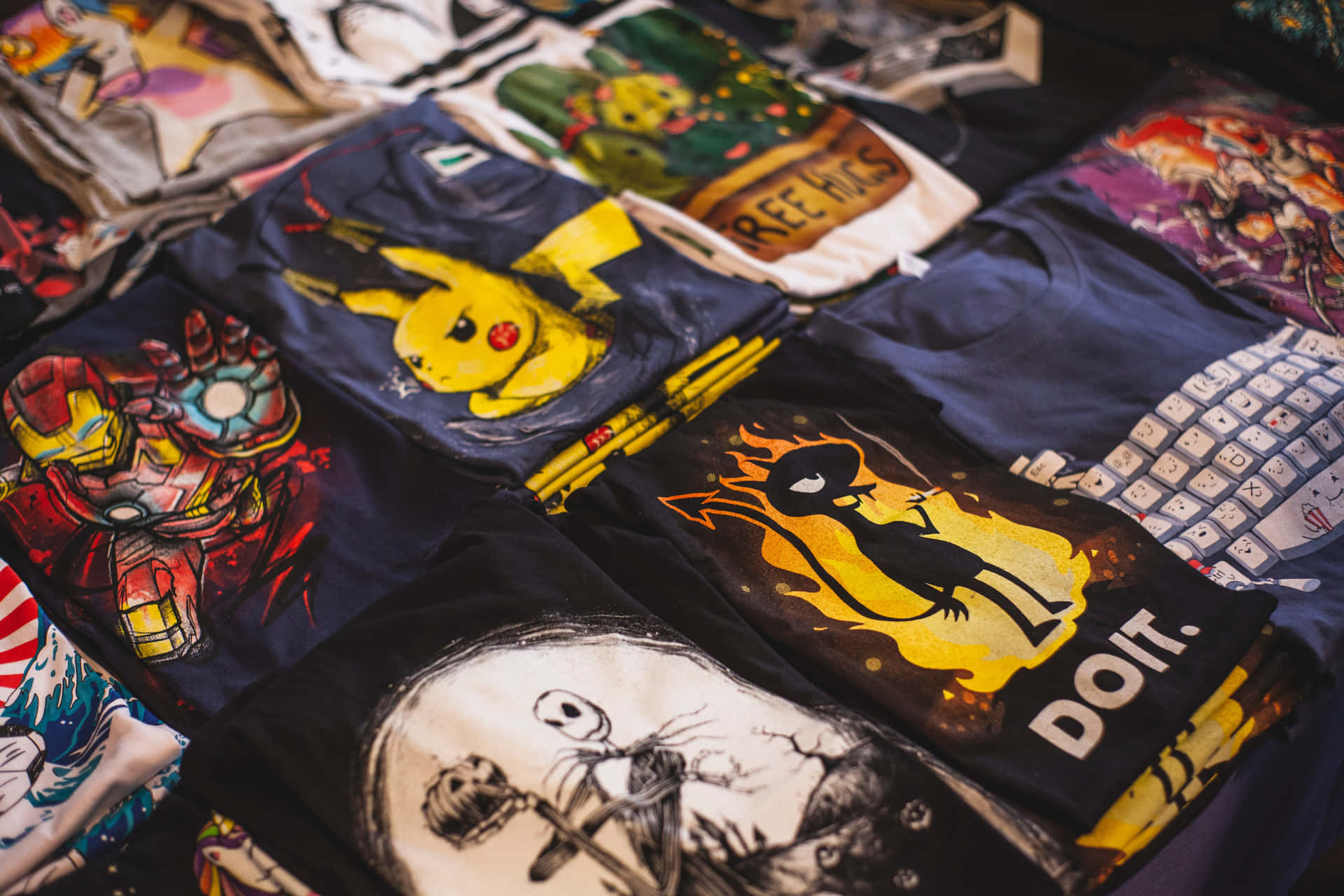 A Table Full Of T - Shirts