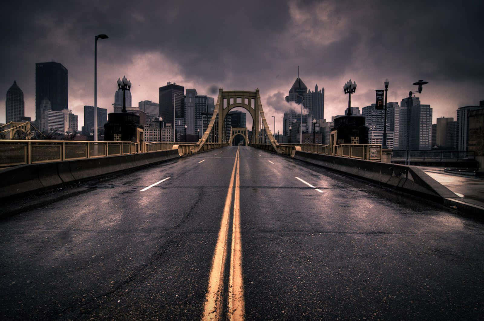 Stormy Cityscape Bridge View Wallpaper