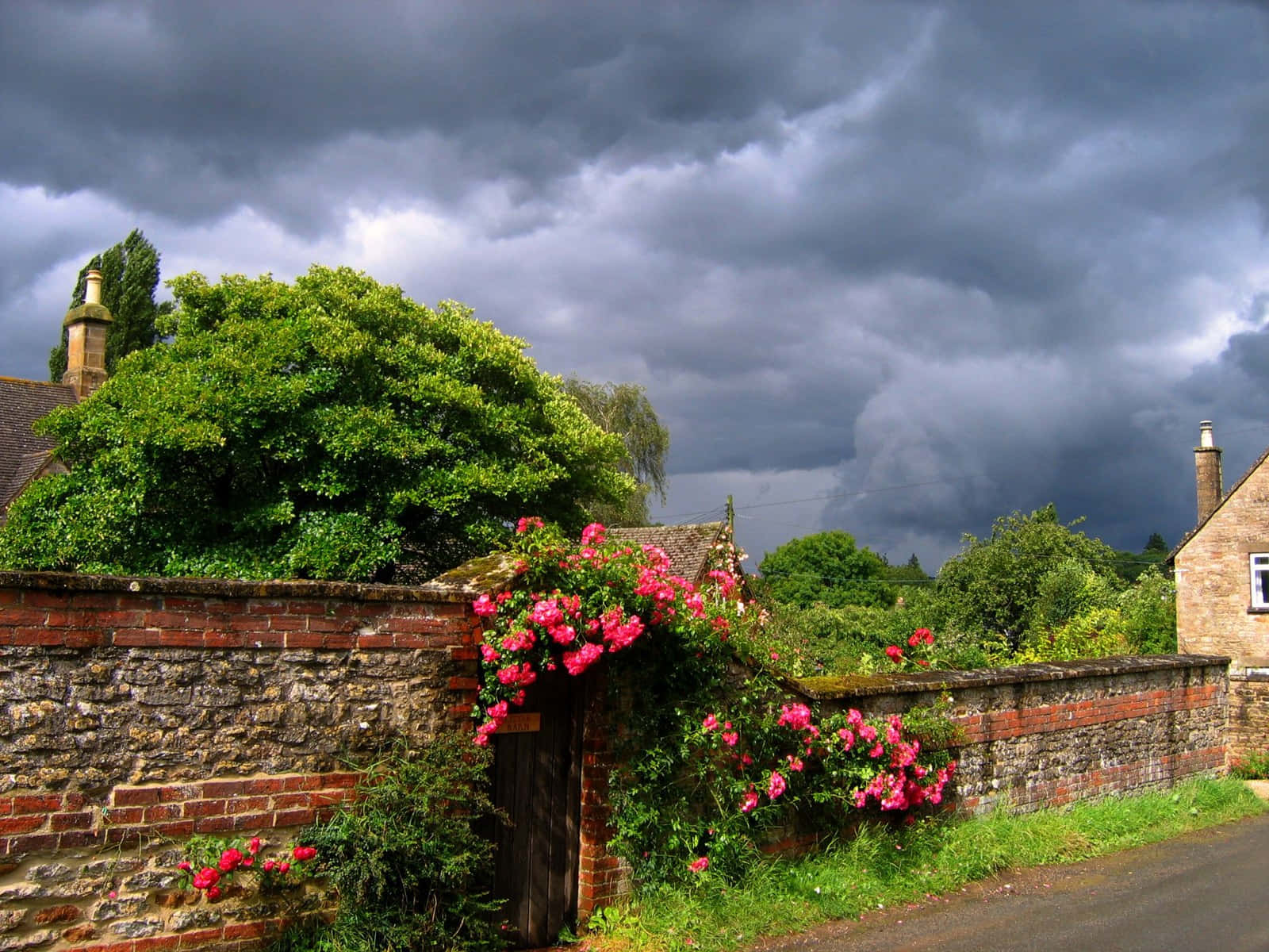 Stormy Skies Over English Countryside Wallpaper
