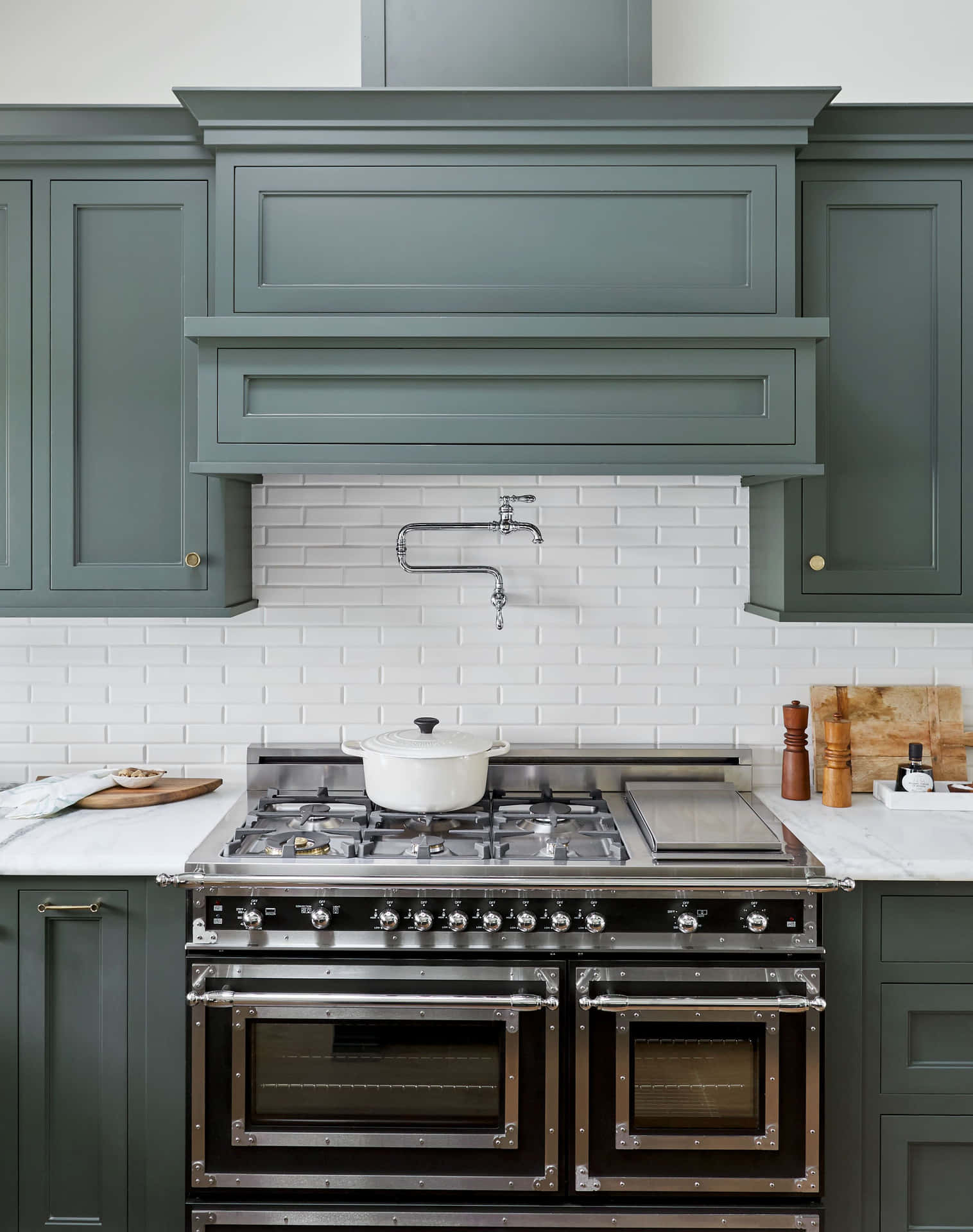 "Cooking with Style: A Stainless Steel Stove in a Modern Kitchen"