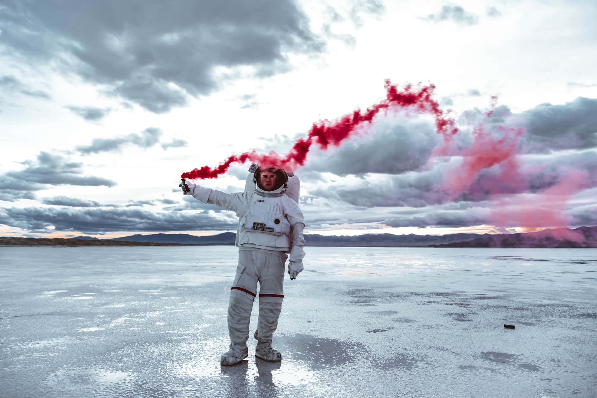 Stranded Astronaut Sending Smoke Signal Wallpaper