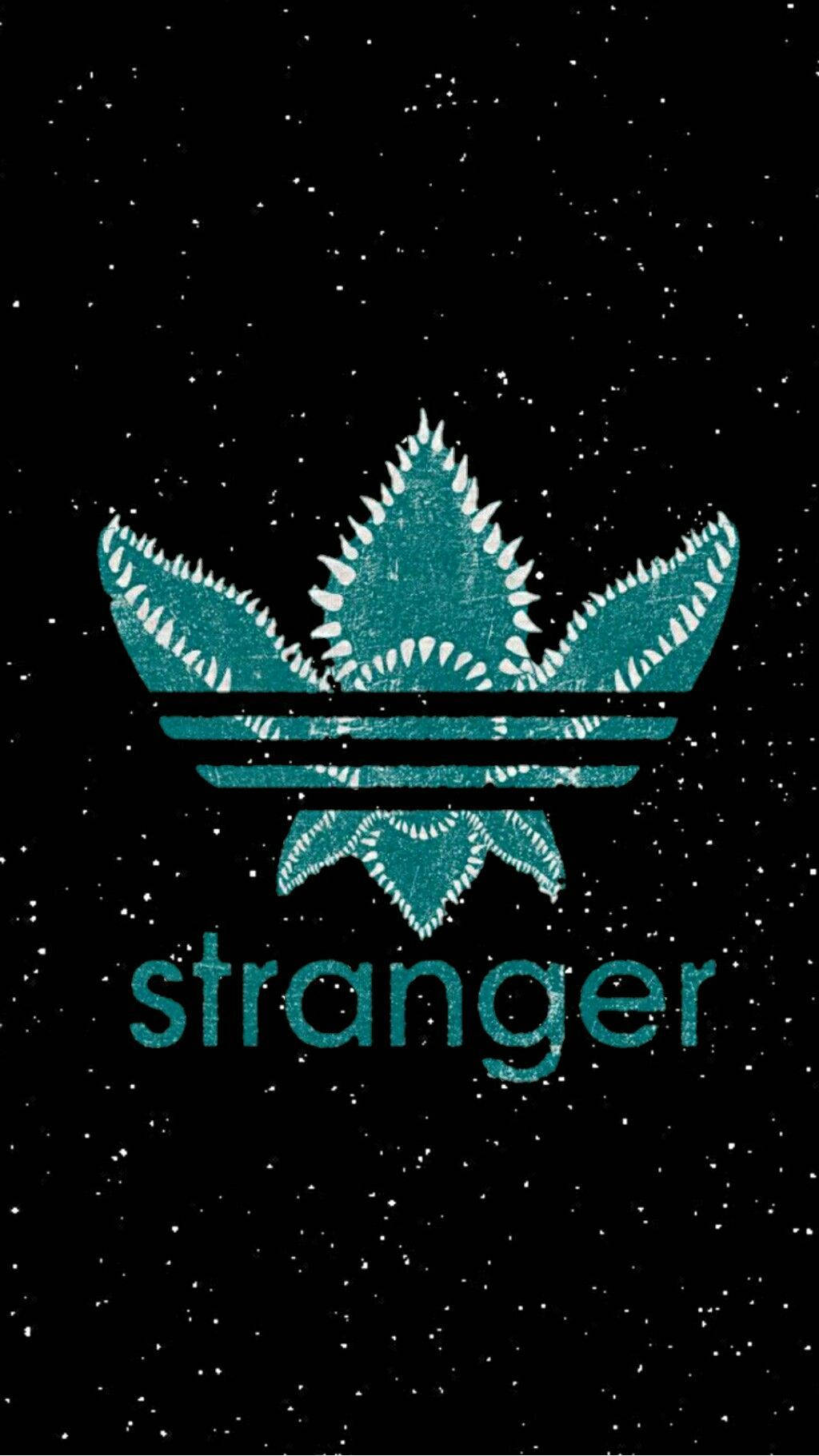 A Black Background With The Word Stranger On It Wallpaper