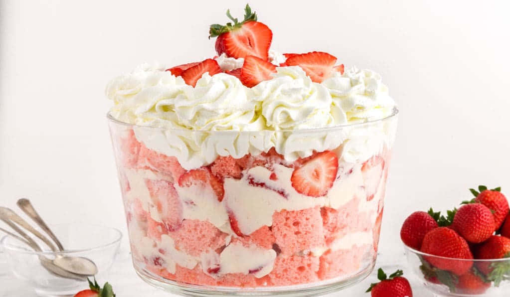 Hintergrundmit Dessert-käsekuchen-trifle Und Erdbeeren