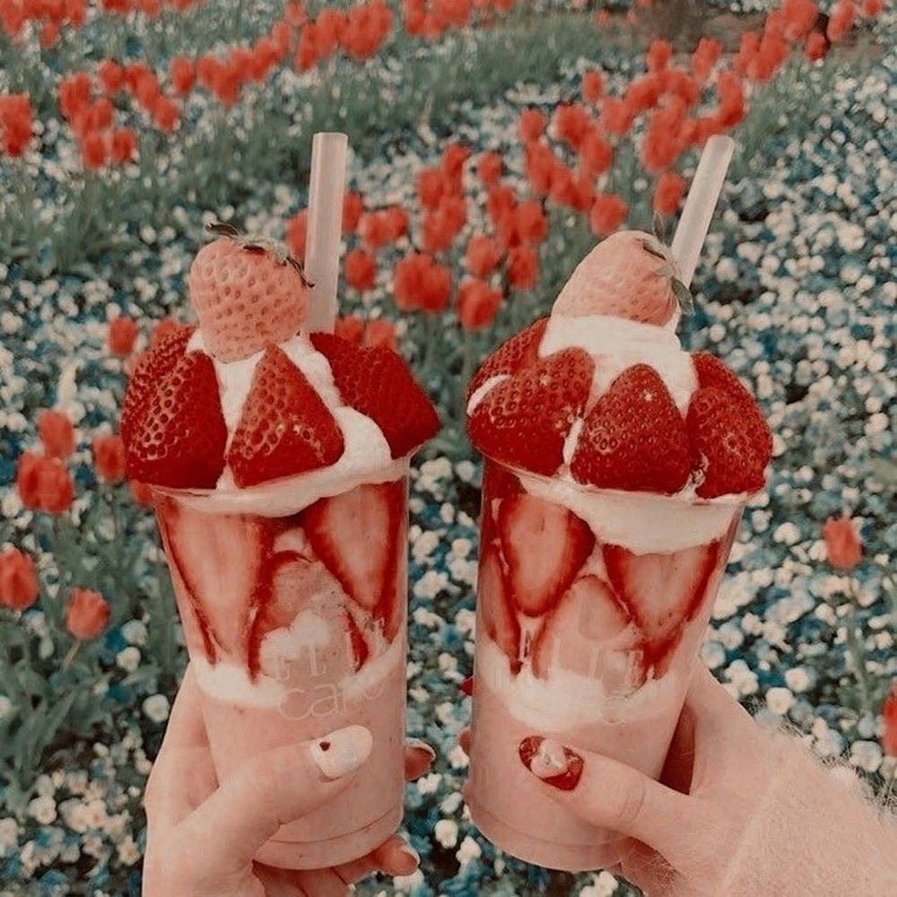 Enjoying a sweet, refreshing strawberry Wallpaper