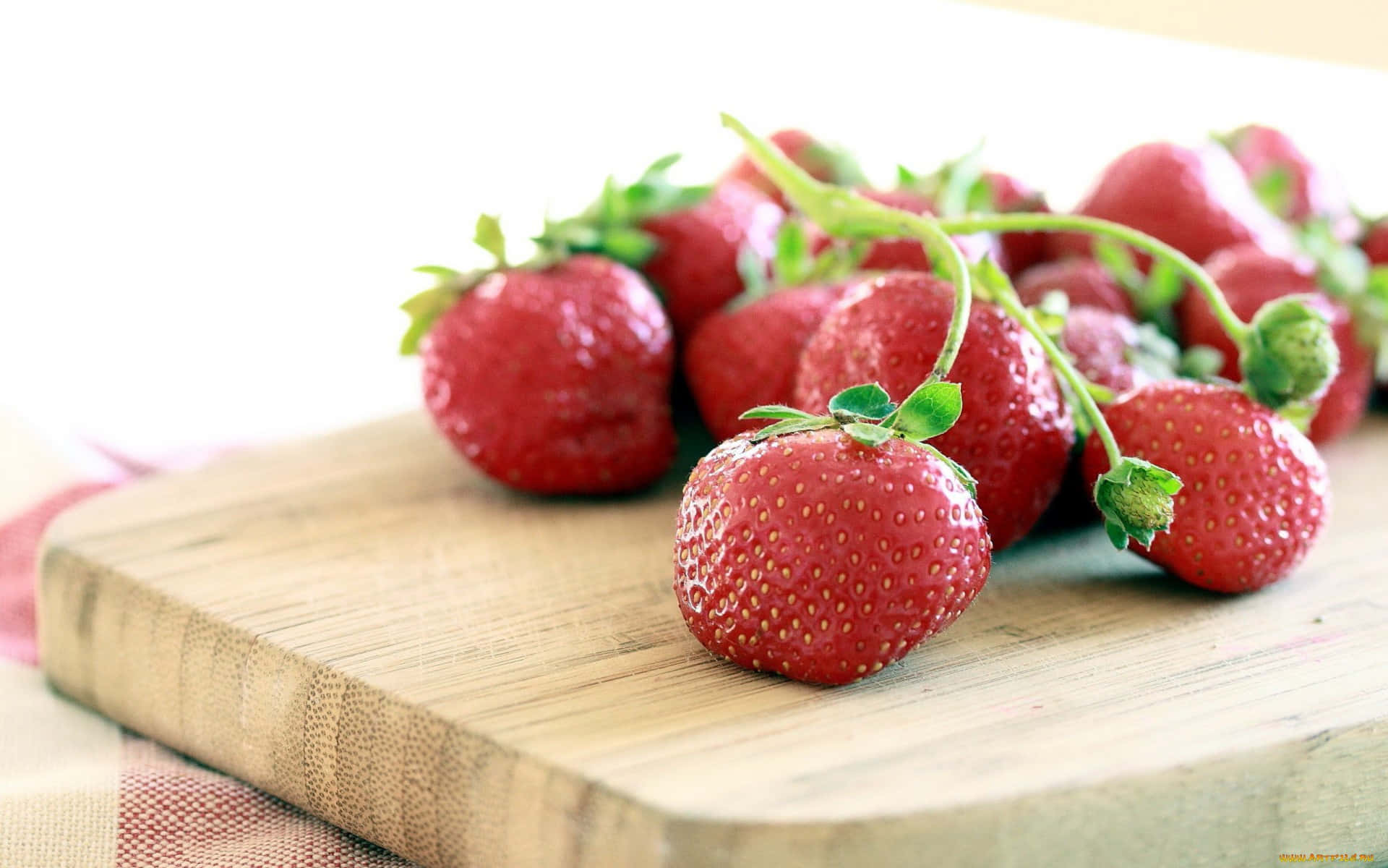 Bright red strawberries, ready to be enjoyed.