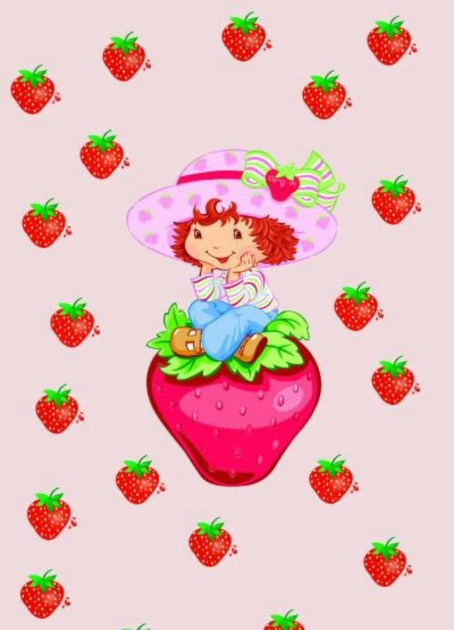 Strawberryshortcake Seduta Su Una Fragola Sfondo