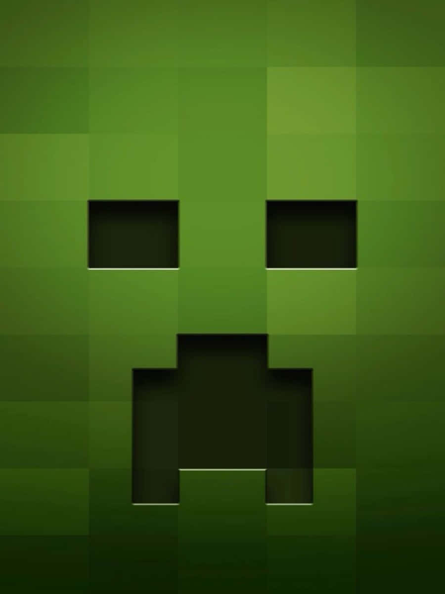 Striking Creeper Face Emblem In Vibrant Green Wallpaper