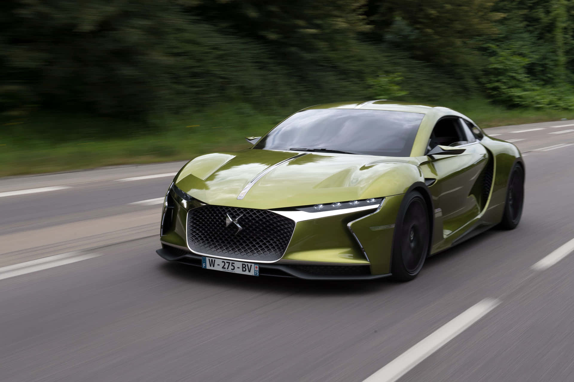 Striking Elegance Of Ds Automobiles Ds E-tense Under City Lights Wallpaper