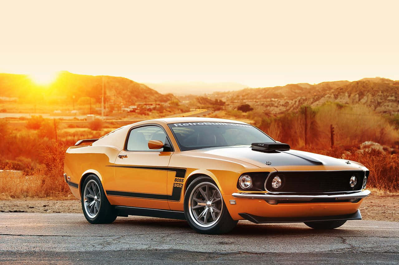 Striking Ford Mustang Boss 302 Bathed In Sunset Light Wallpaper