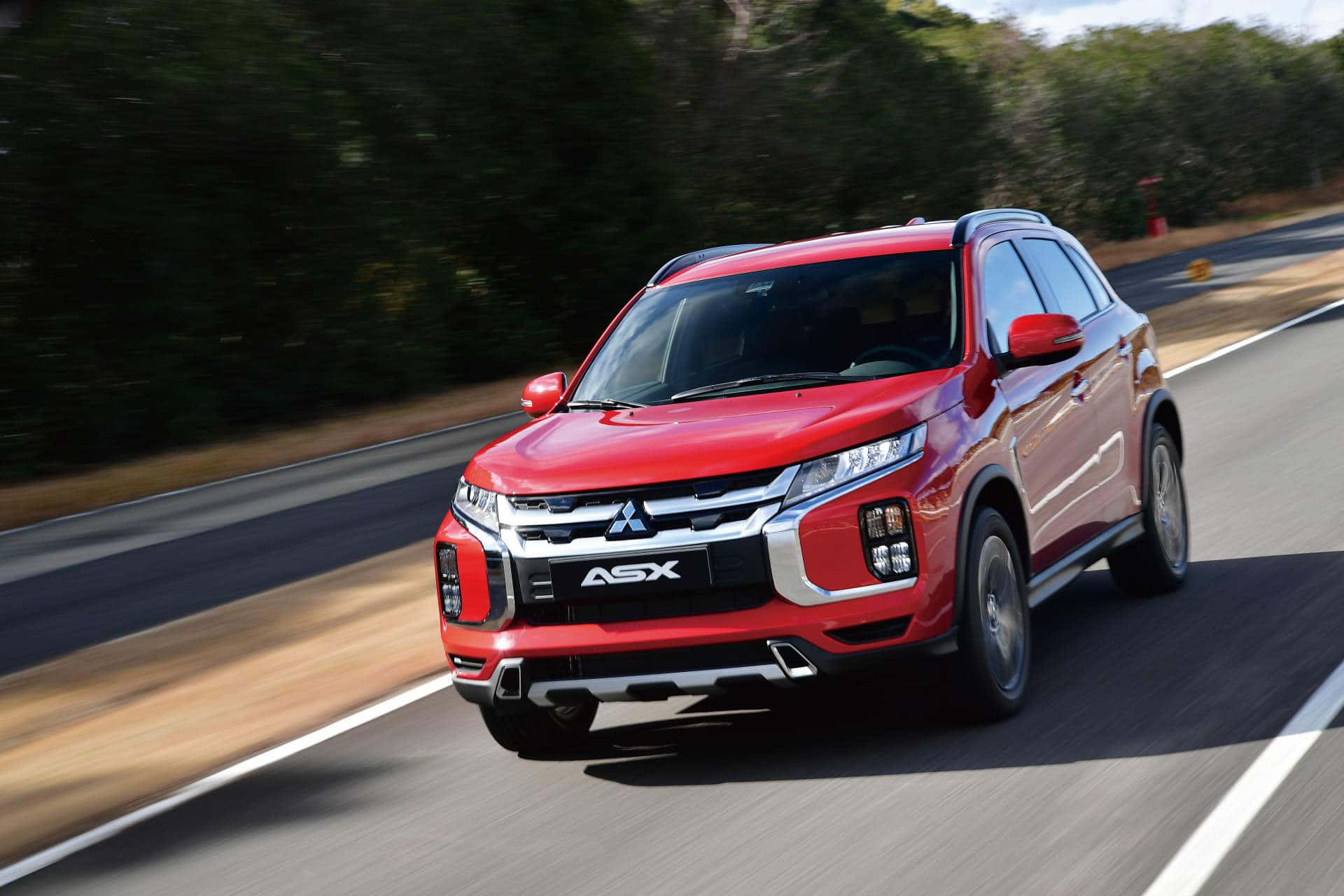 Striking Mitsubishi Asx Against Urban Backdrop Wallpaper