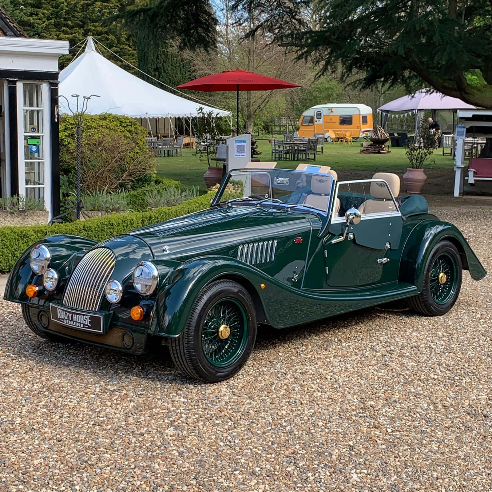 Striking Morgan Plus Four In Action On Open Road Wallpaper