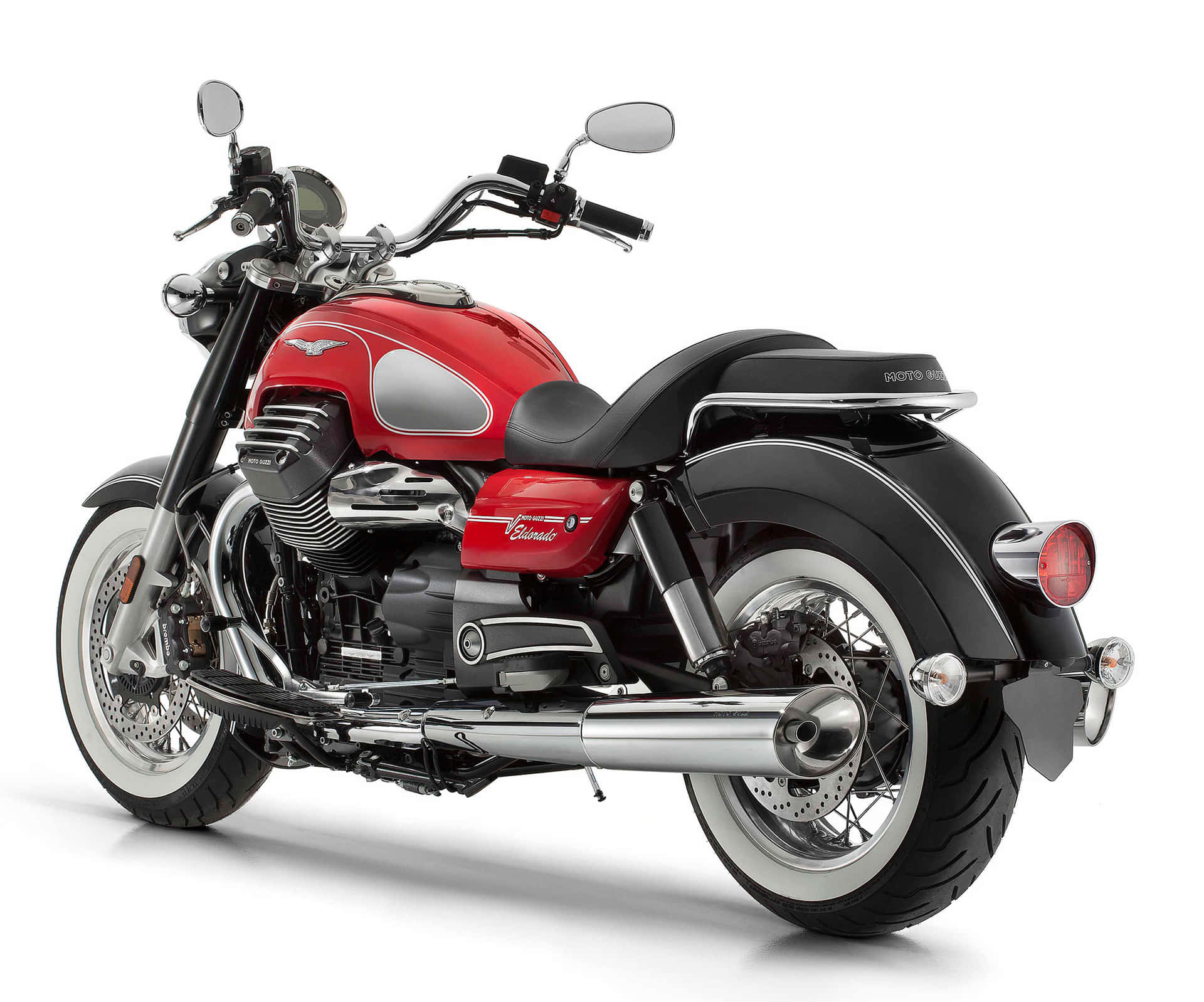 Striking Moto Guzzi Motorcycle On The Open Road Wallpaper