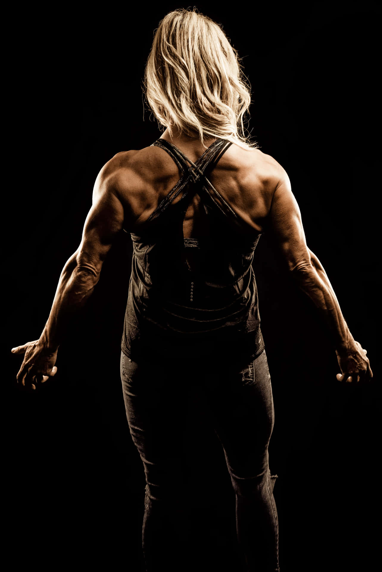 Strong Woman Back Muscle Flex Wallpaper
