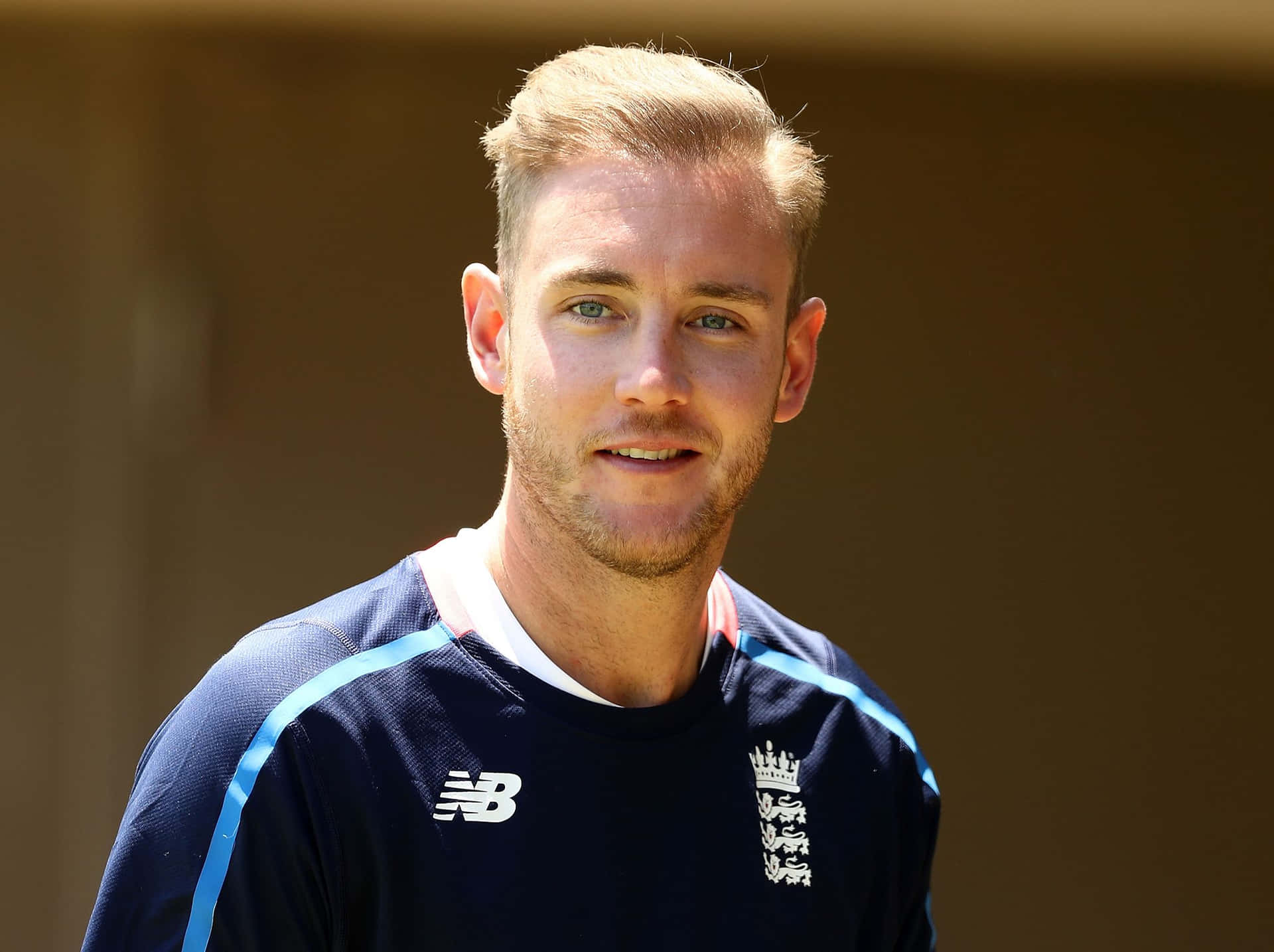 Stuart Broad Expressing Joy With A Wide Smile Wallpaper