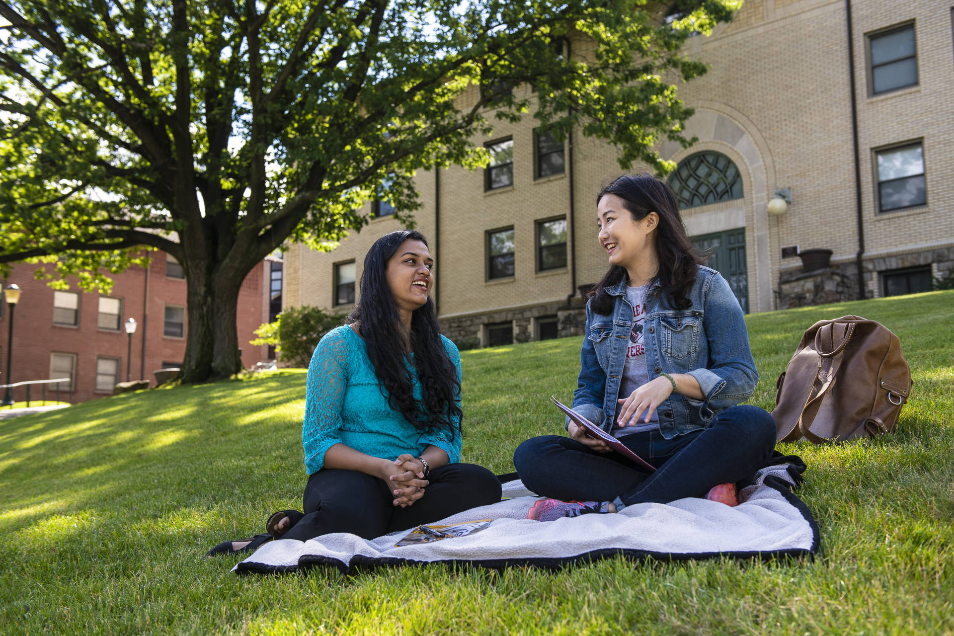 Students On Grass At Carnegie Mellon University Wallpaper