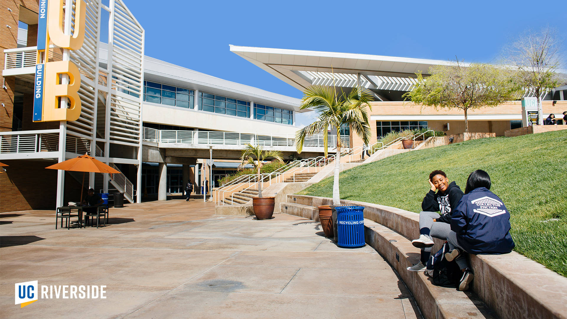 Students Outside Ucr Hub Building Wallpaper