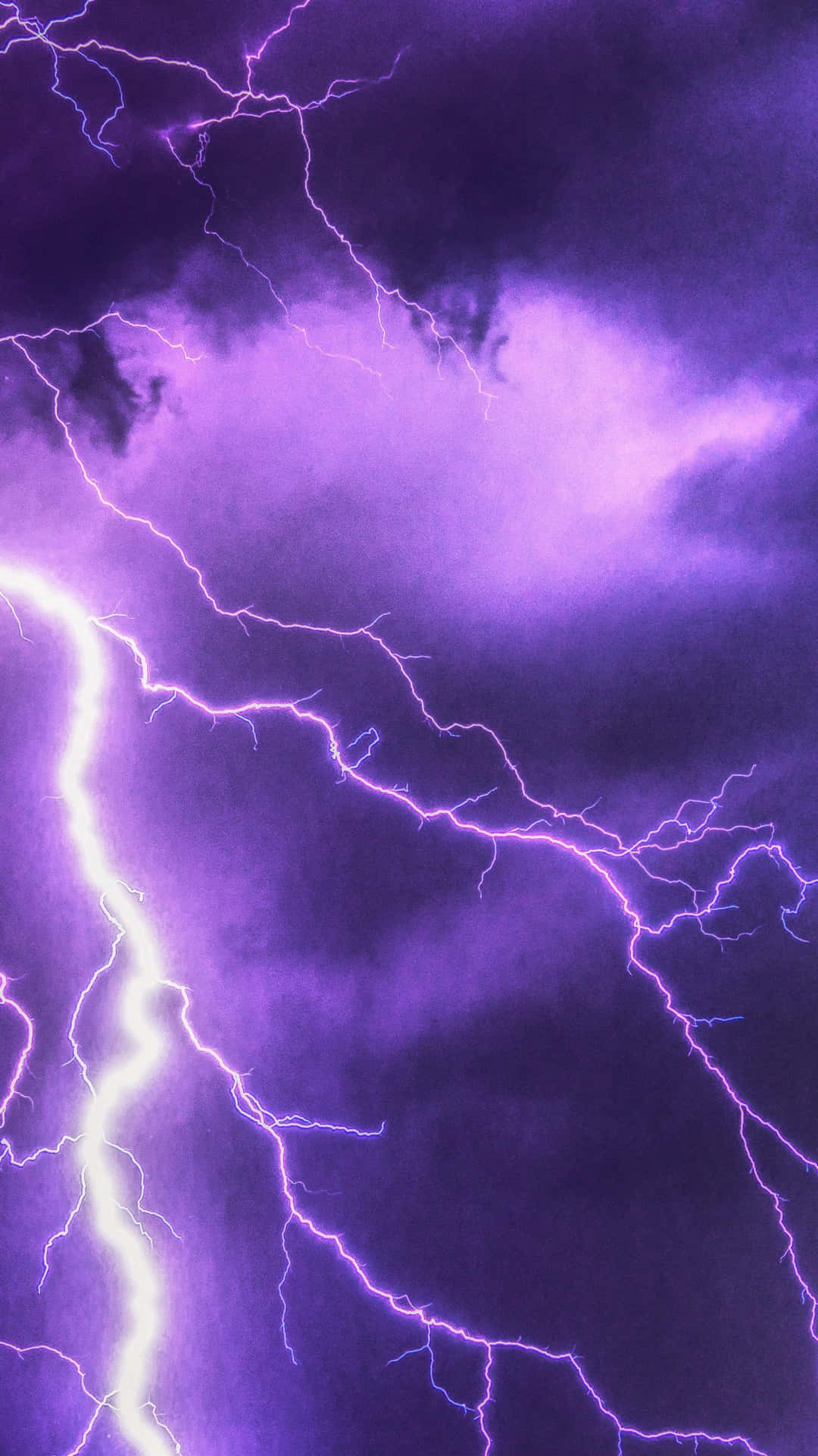 Stunning Display Of Purple Lightning In Night Sky