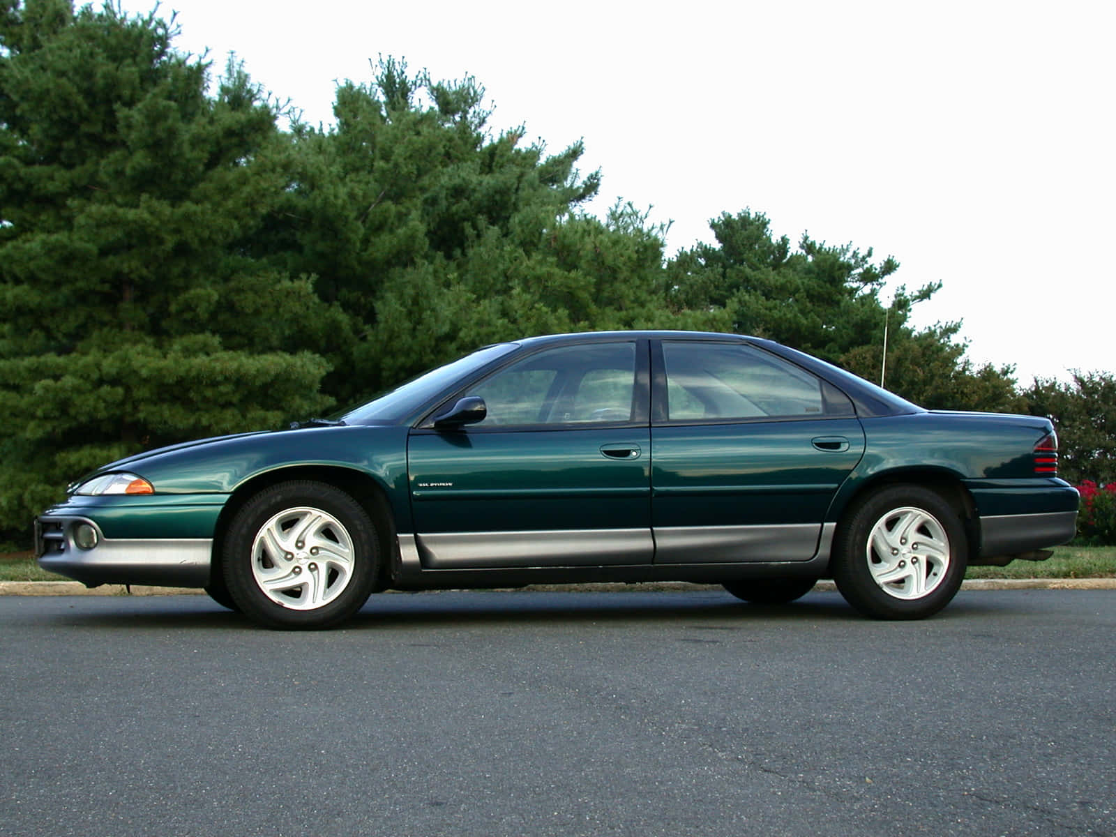 Stunning Dodge Intrepid Racing On The Highway Wallpaper