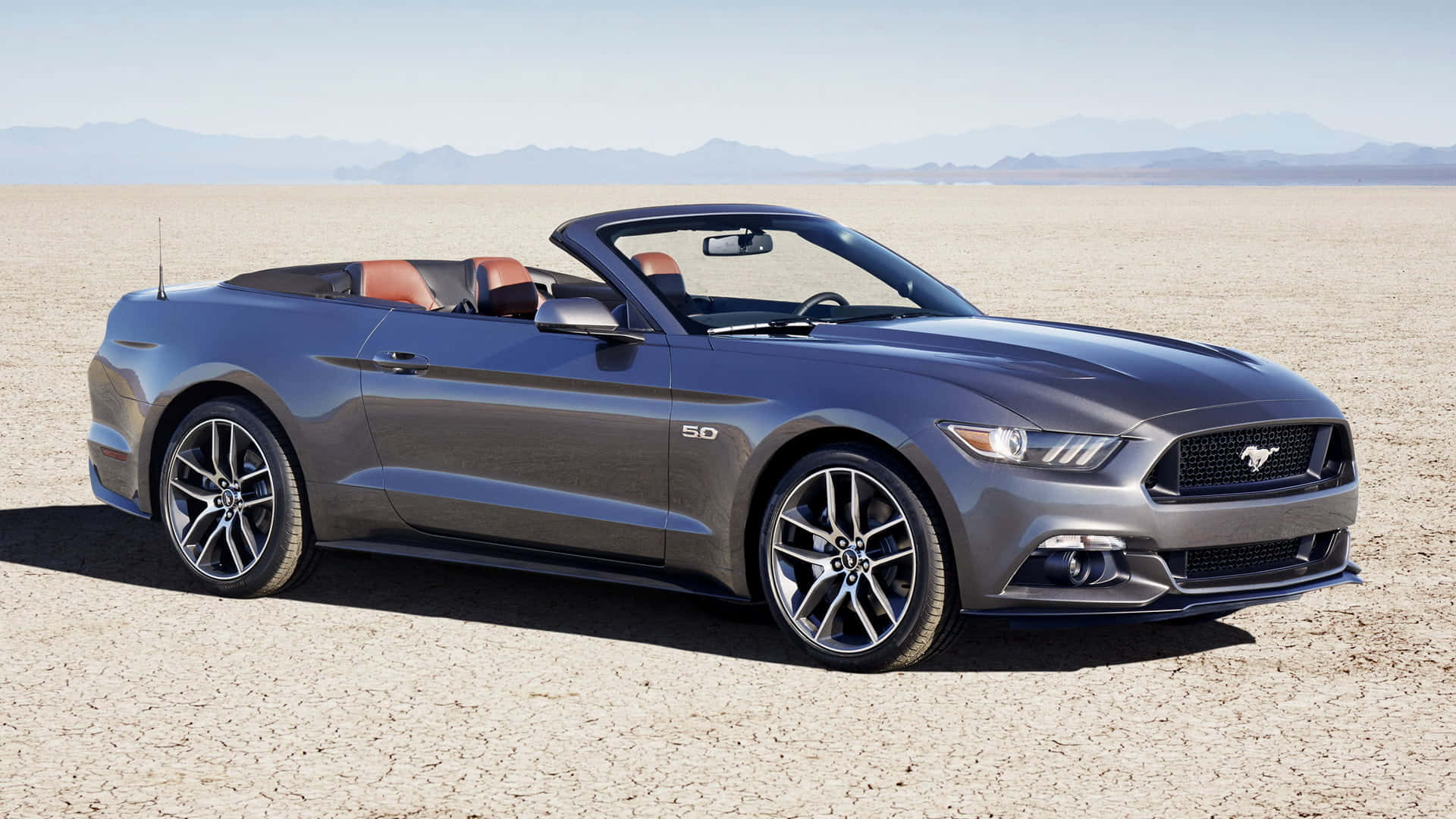 Stunning Ford Mustang Gt Convertible In A Breathtaking Sunset Wallpaper