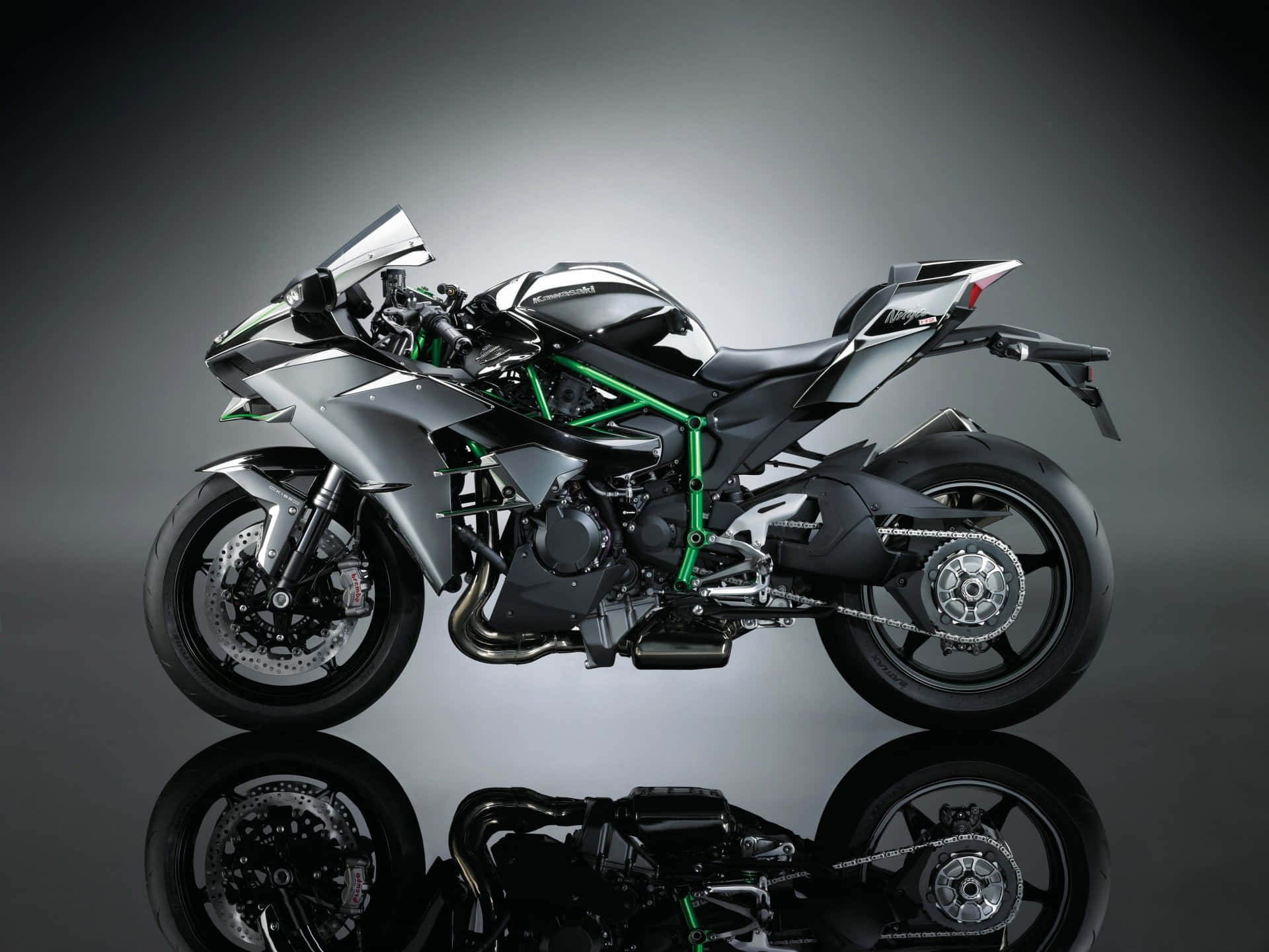 Stunning Kawasaki Motorcycle In Full Throttle Wallpaper