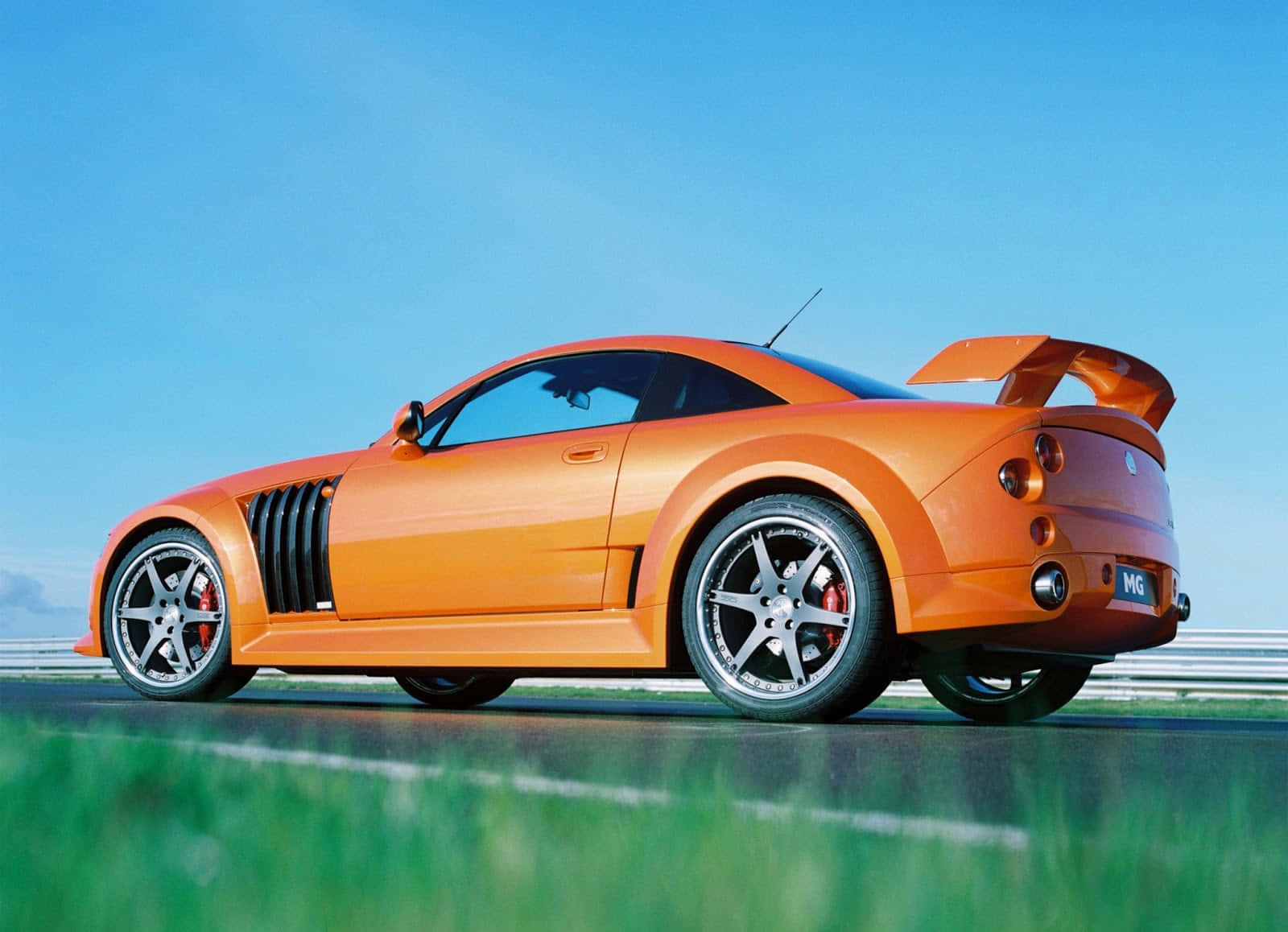 Stunning Mg Xpower Sv Raging On The Road Wallpaper