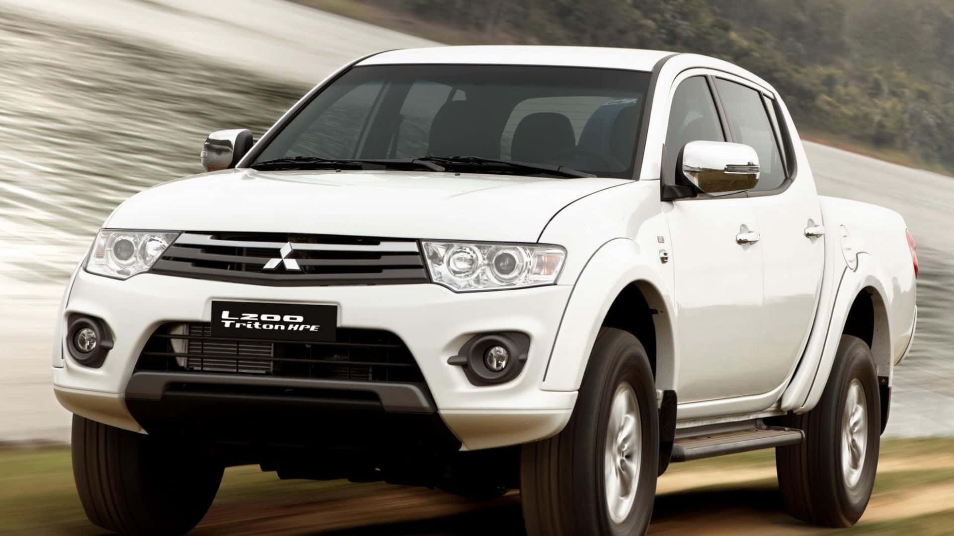 Stunning Mitsubishi Triton In Action Wallpaper