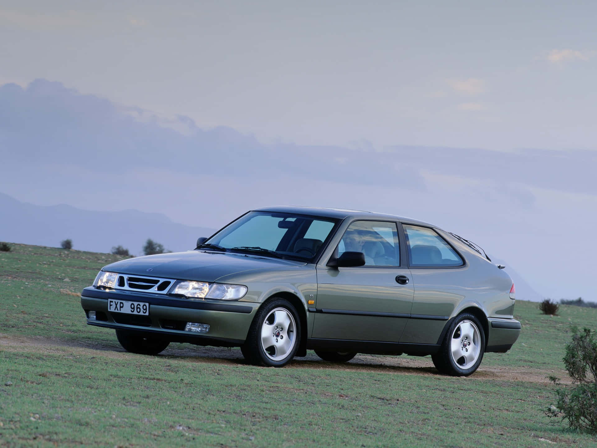 Stunning Saab 9-3 Gliding On The Road Wallpaper