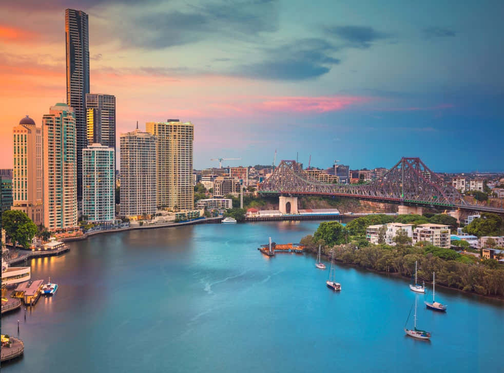 Stunning Sunset Over Brisbane Skyline Wallpaper