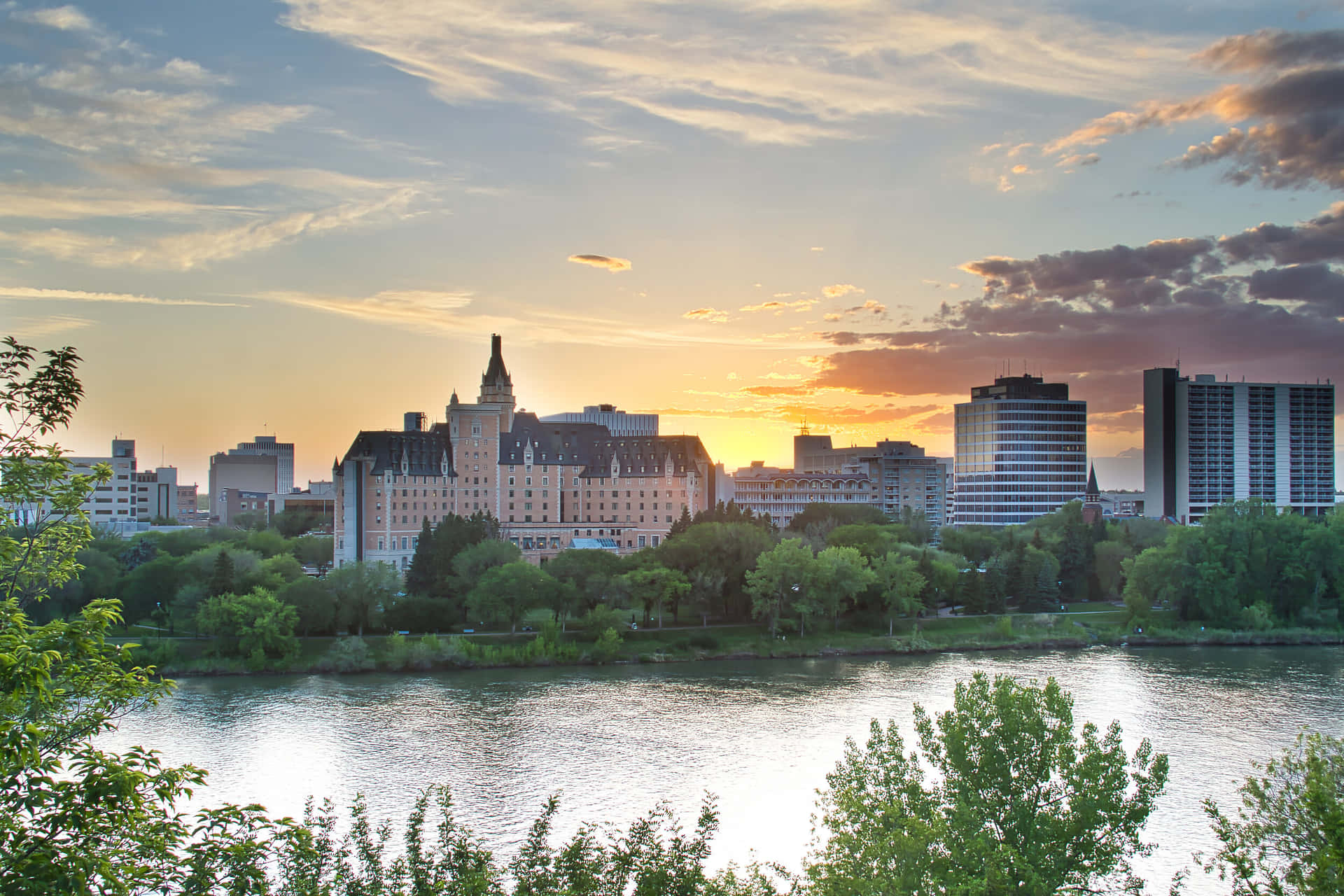 Stunning Sunset Over Saskatoon's Skyline Wallpaper