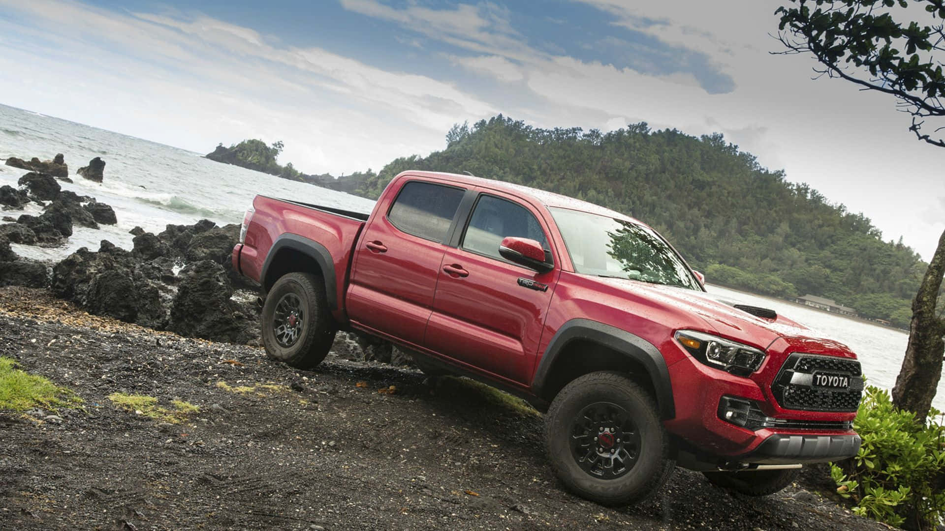 Stunning View Of A Toyota Tacoma Braving The Wilderness. Wallpaper