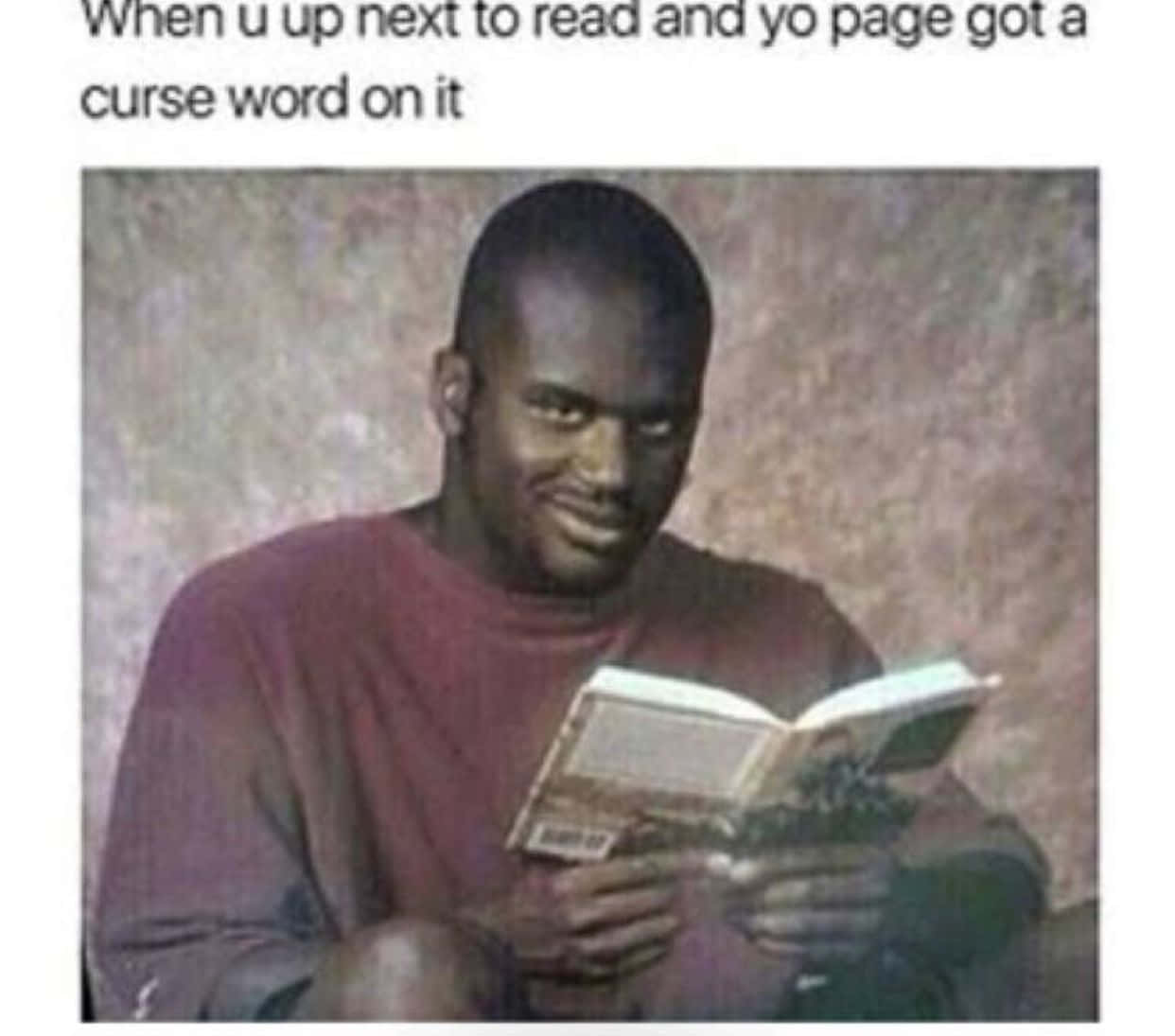 A Man Reading A Book With The Caption When Next To Read Yo Page A Curse Word On It