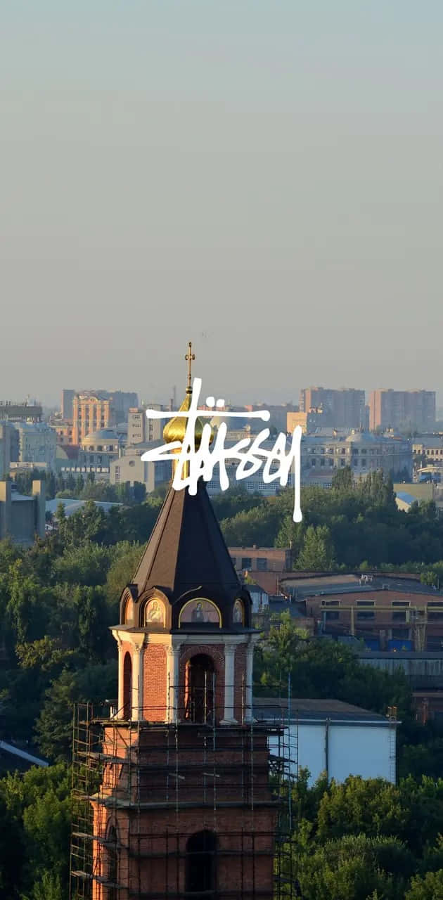 Stussy Logo Over Cityscape Wallpaper