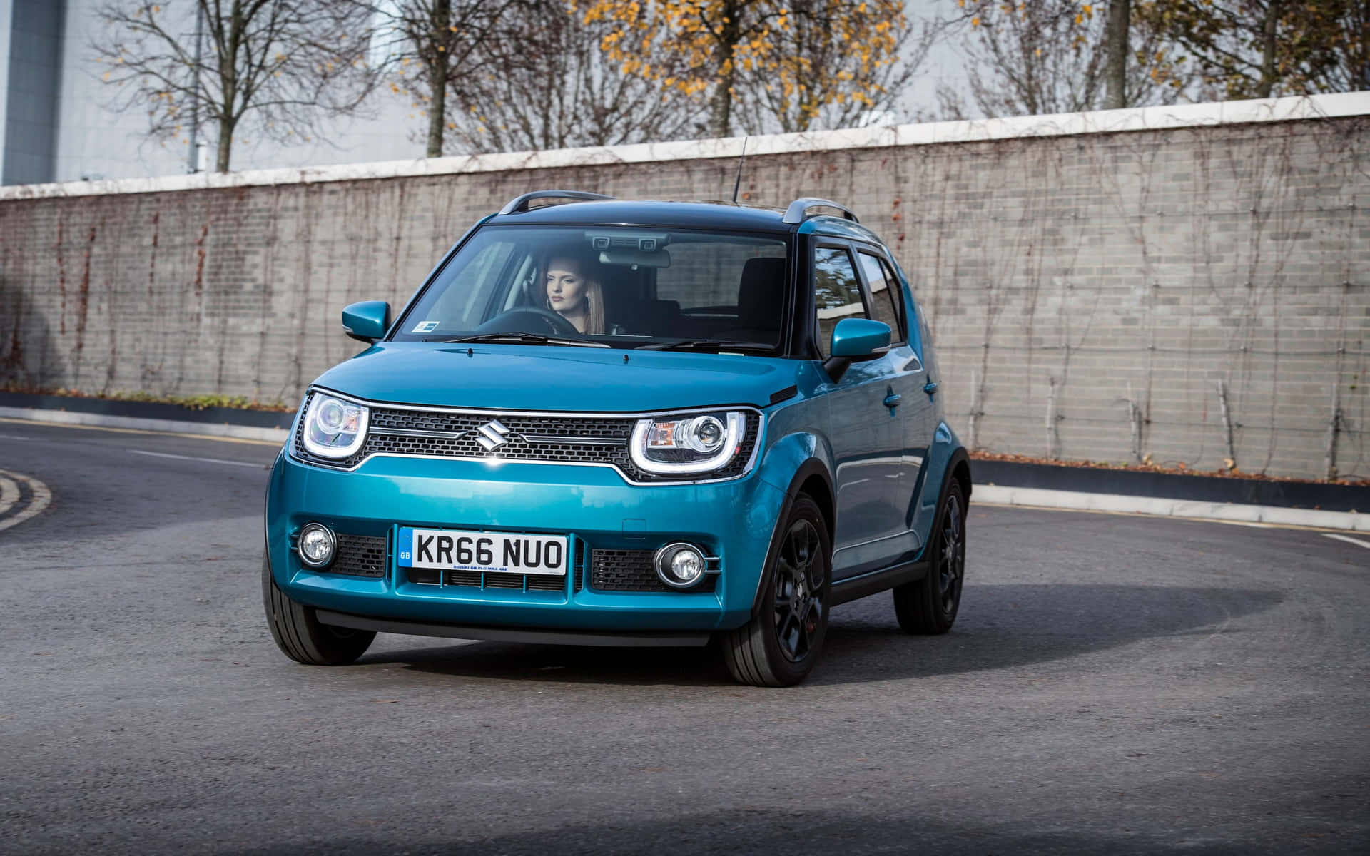 Stylish And Compact Suzuki Ignis On A Scenic Route Wallpaper