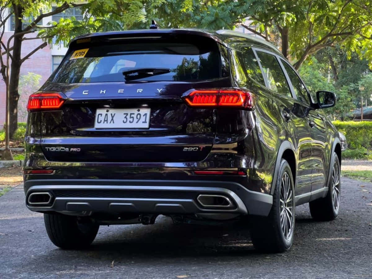 Suv Chery Tiggo 8 Élégant Et Sportif Sur La Route Fond d'écran