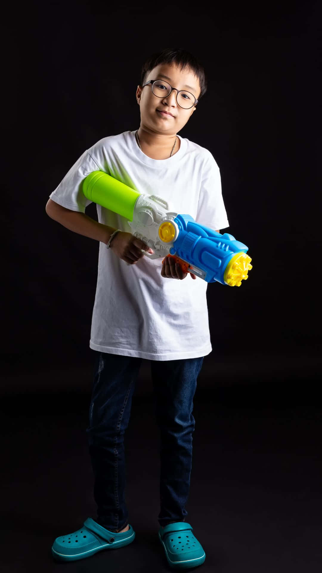 Stylish Boy With Water Gun Wallpaper