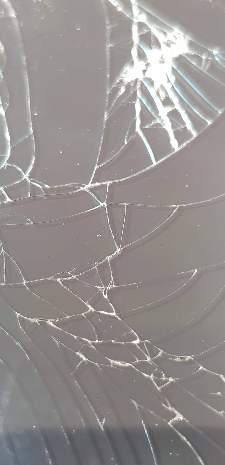 Stylish Image Of Broken Glass Screen Wallpaper