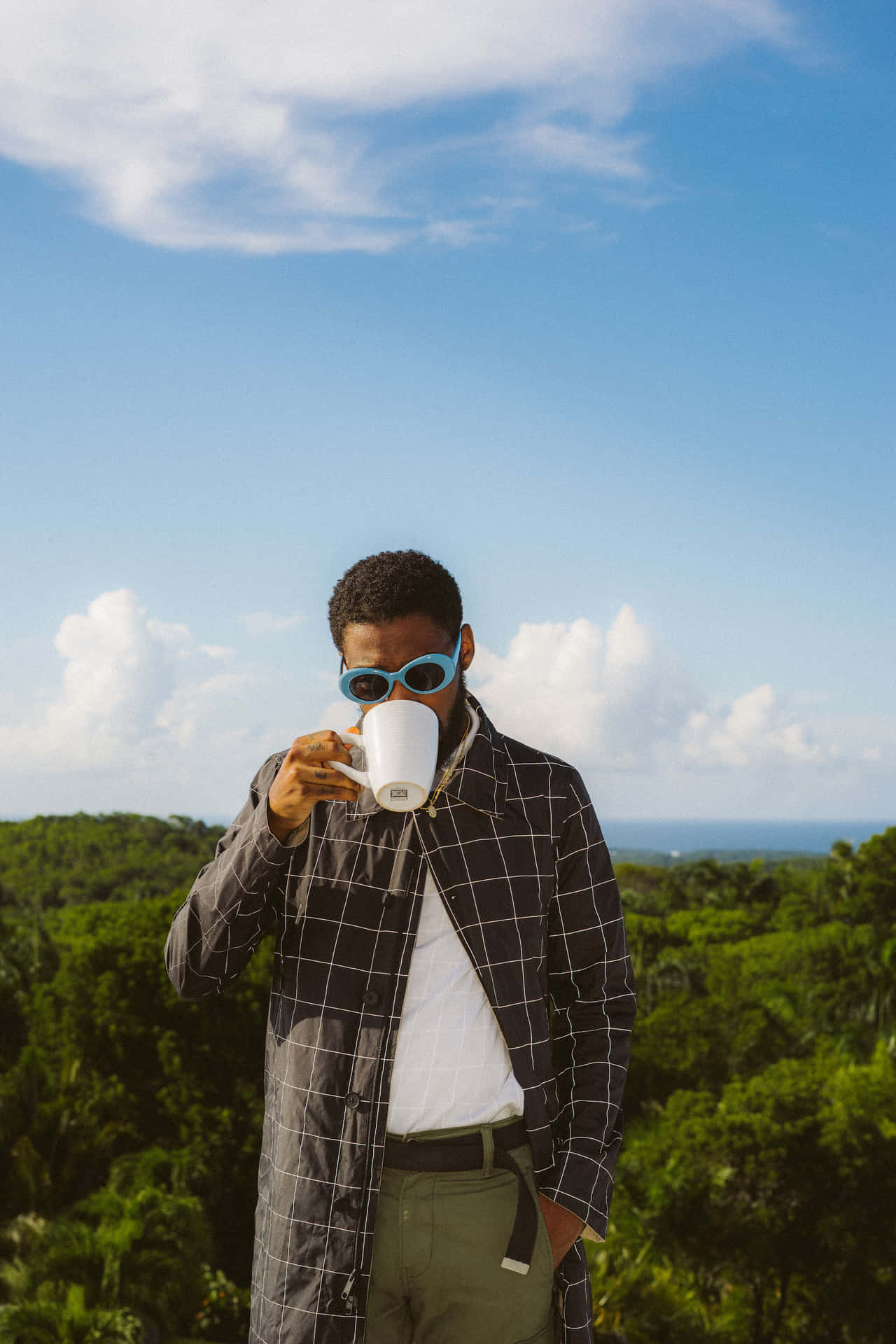 Stylish Man Drinking Coffee Outdoors Wallpaper