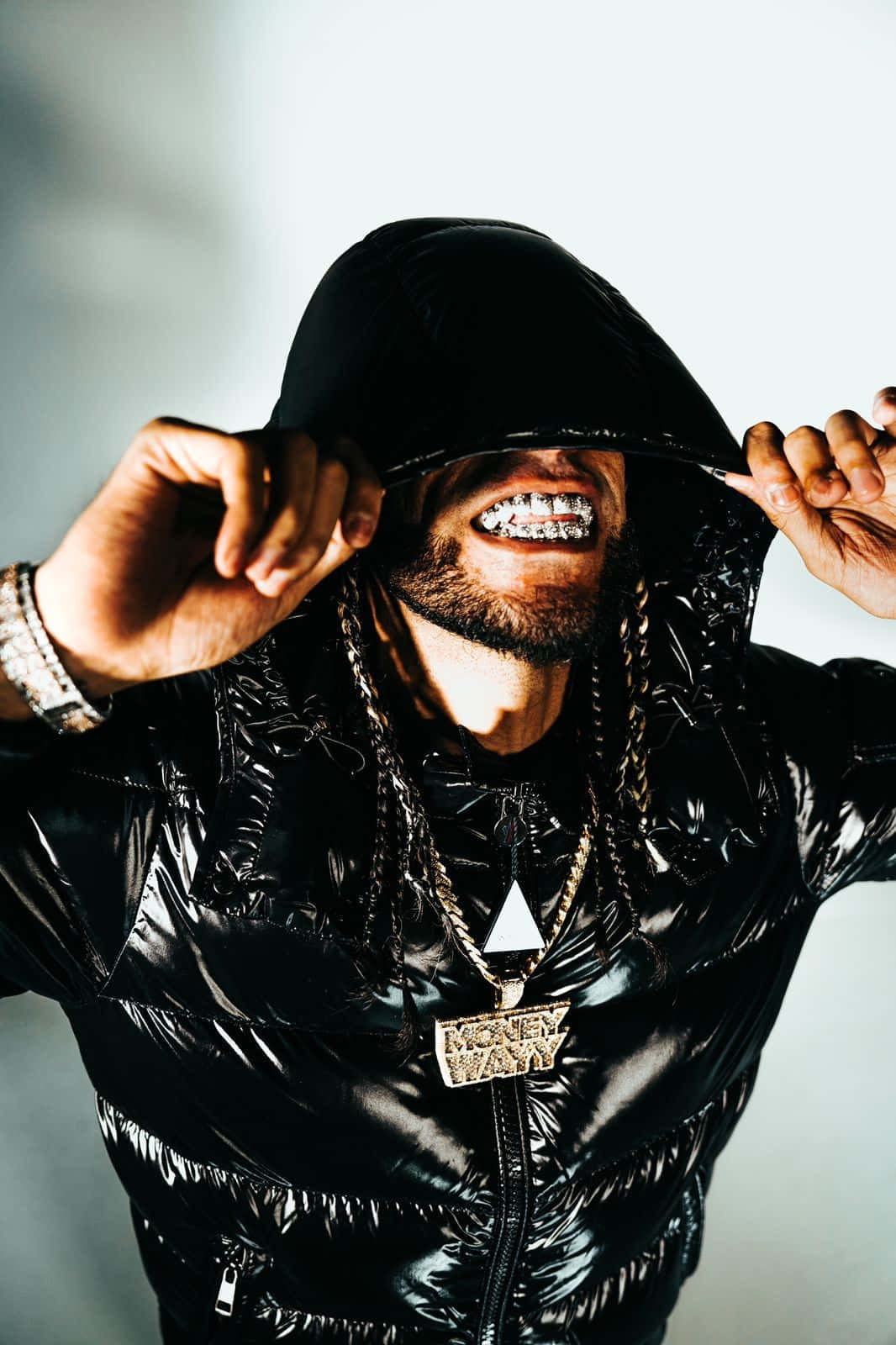 Stylish Man With Hoodie And Grillz Wallpaper