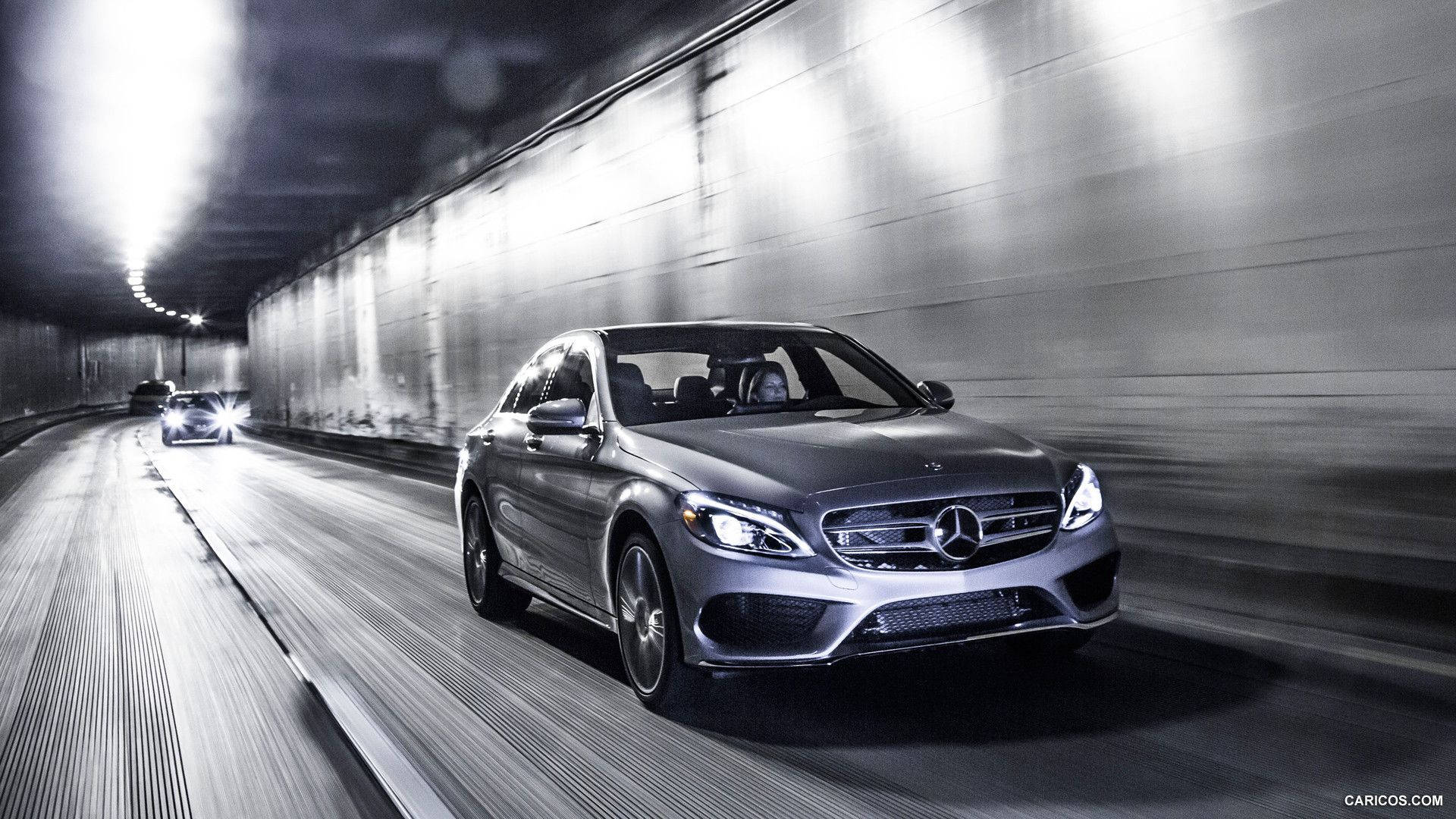 Stylish Mercedes Benz C300 On The Move Wallpaper
