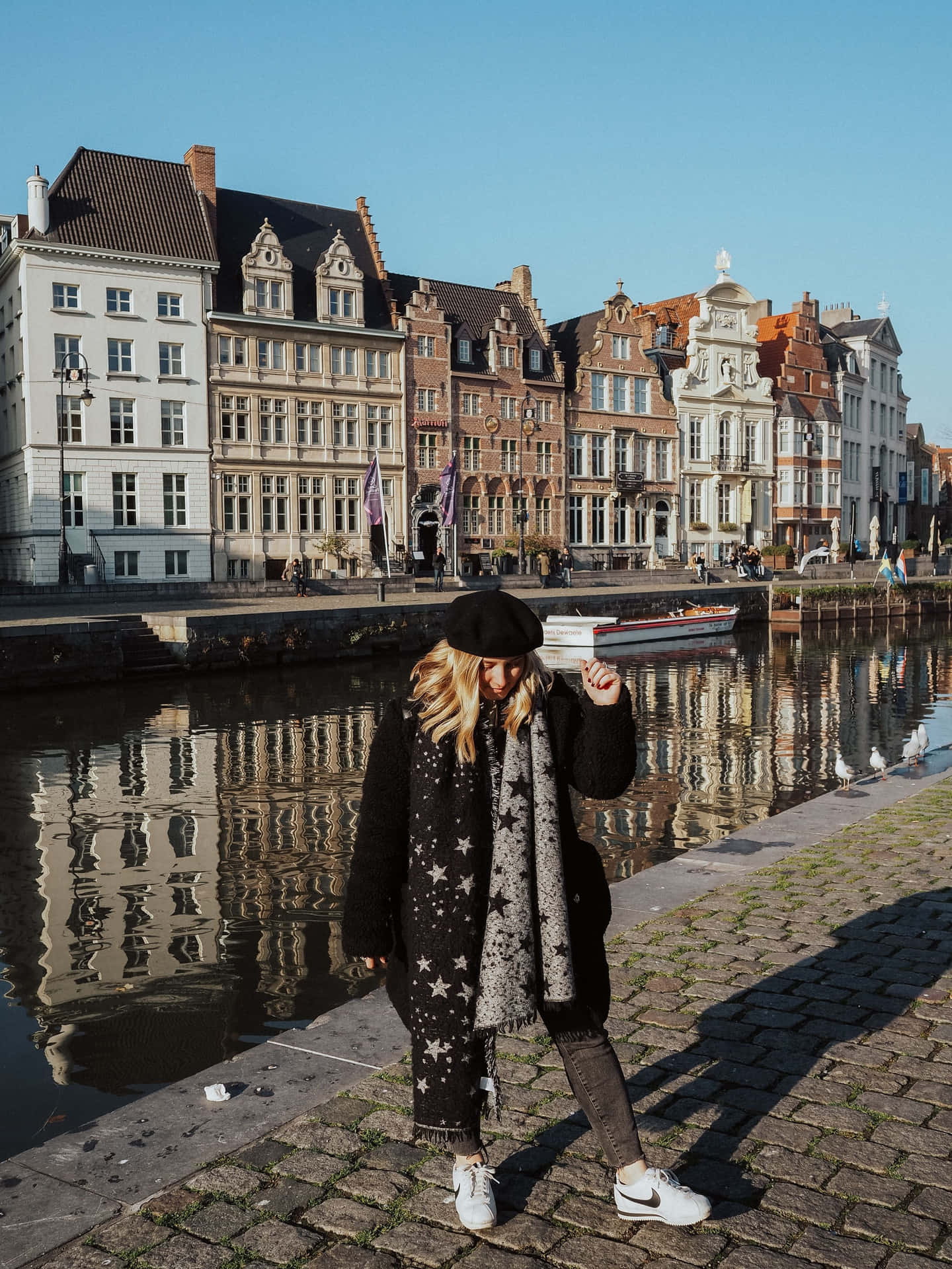 Stylish Woman Waterfront European Cityscape Wallpaper
