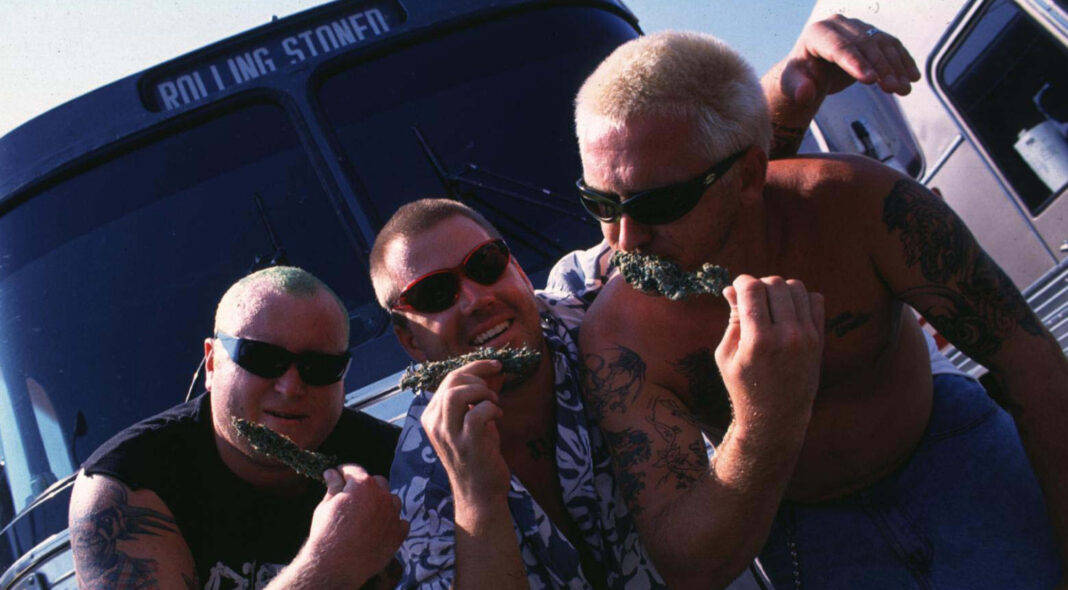 Iconic Sublime Band Poses in Front of a Graffiti Bus Wallpaper