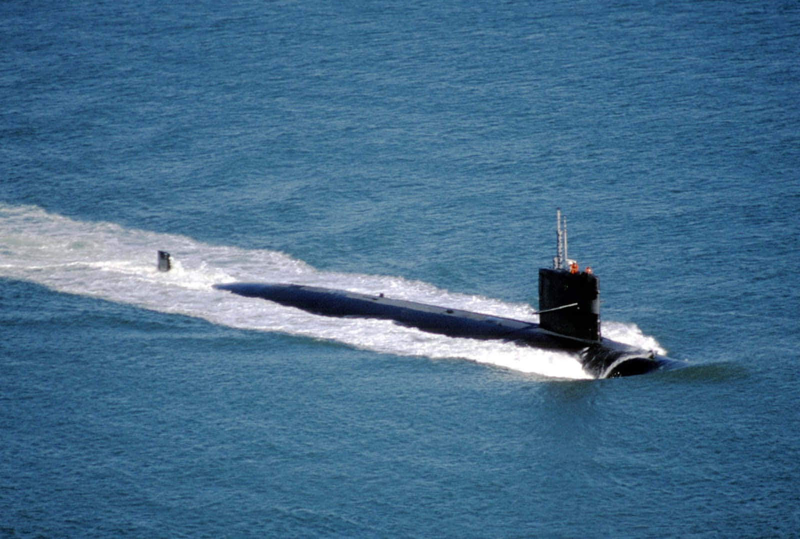 A submarine navigating through a peaceful ocean