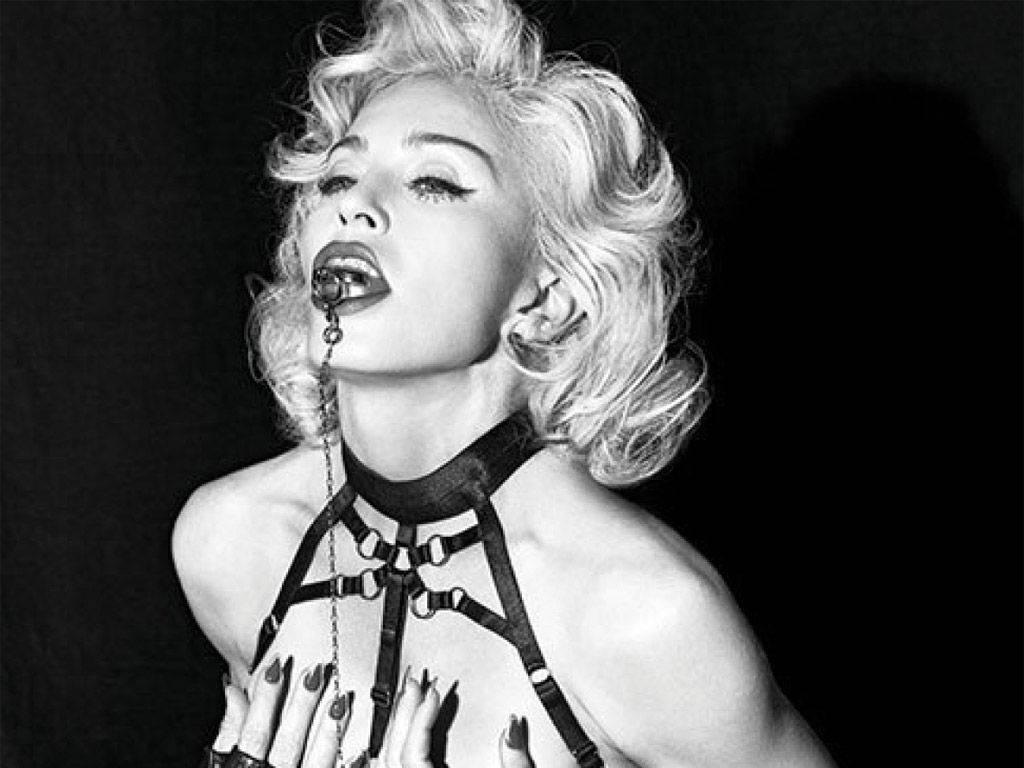Submissive Madonna In Black And White Background