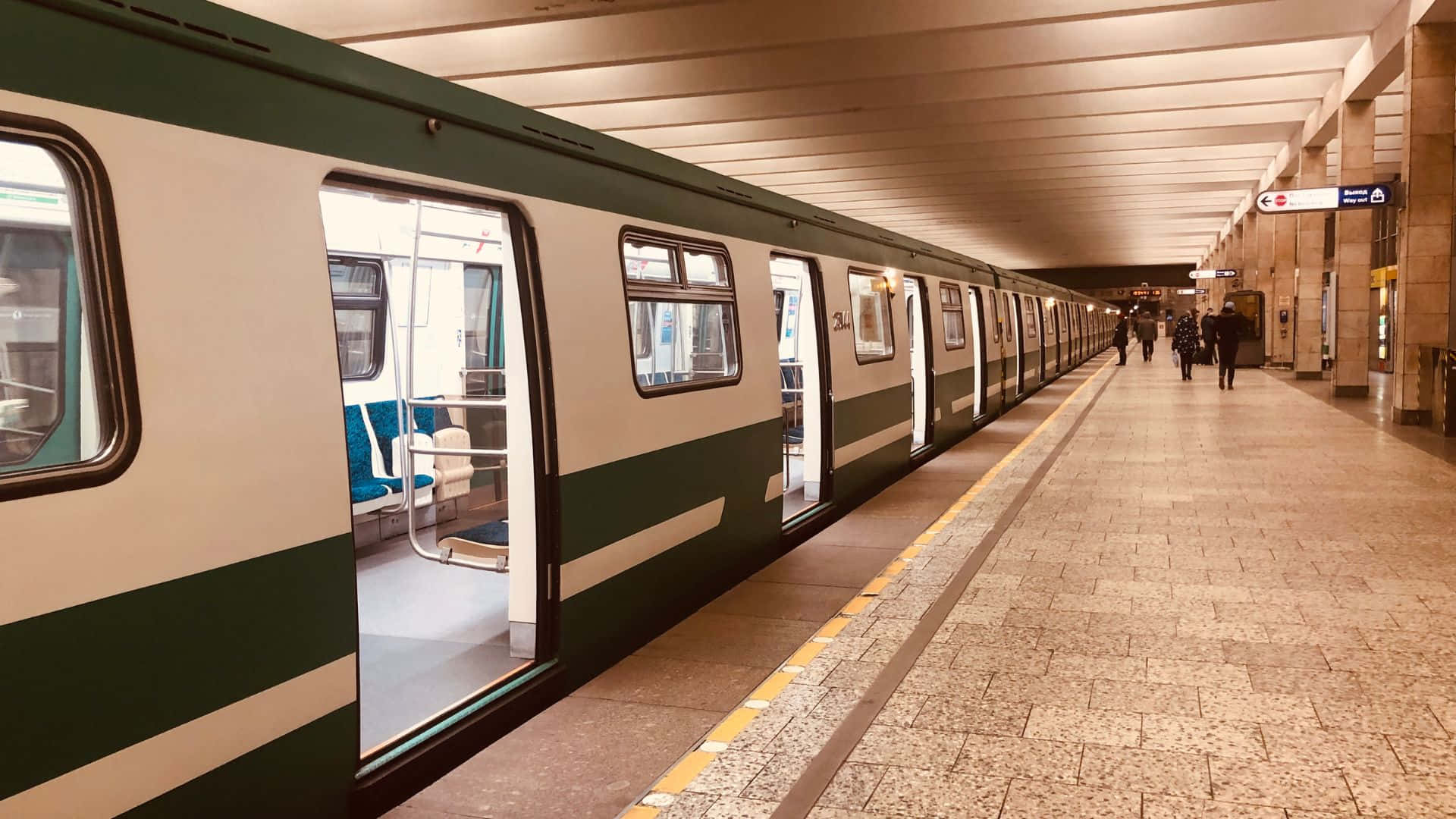 Subway train in motion at underground station