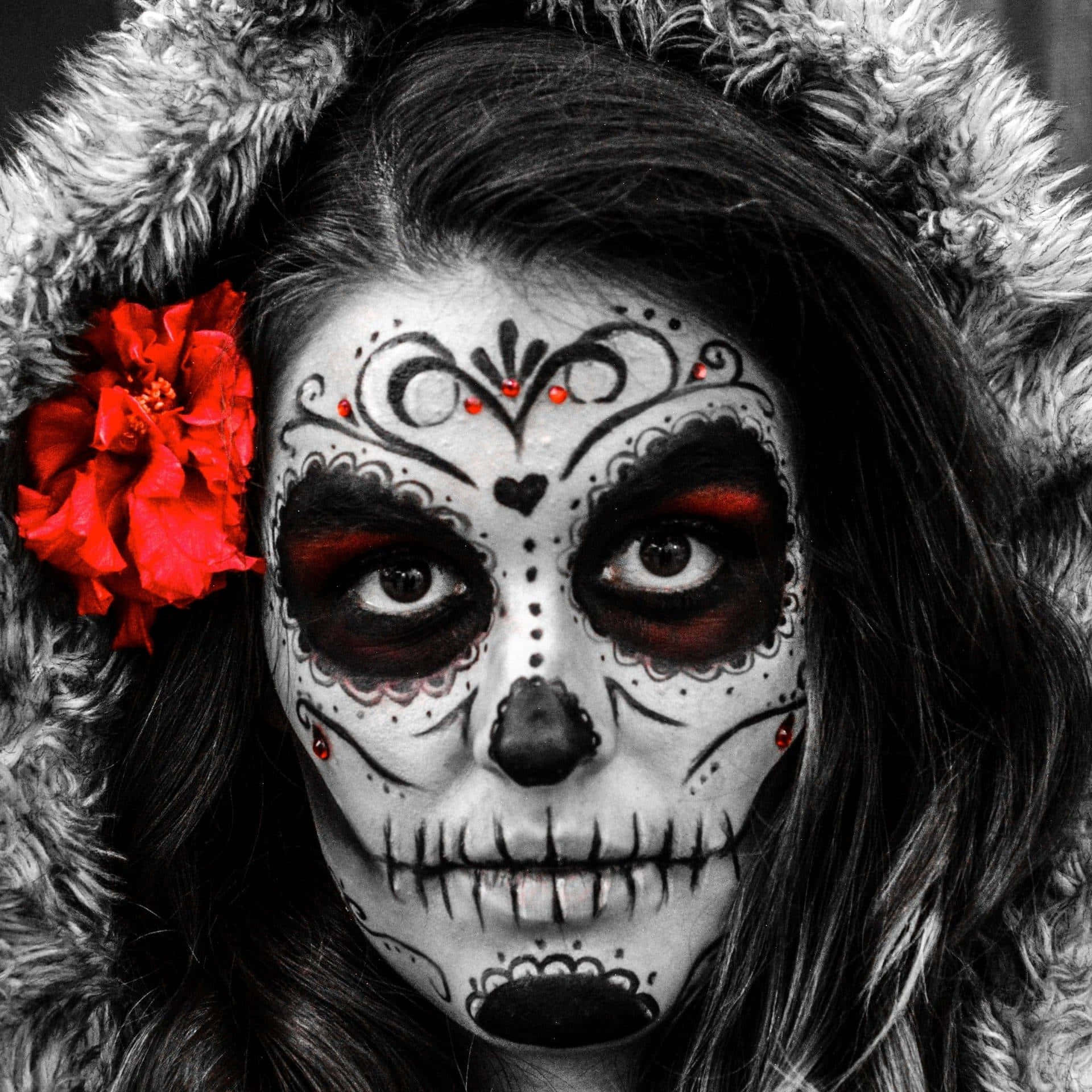 A colorful Sugar Skull inspired design graces this mobile phone Wallpaper