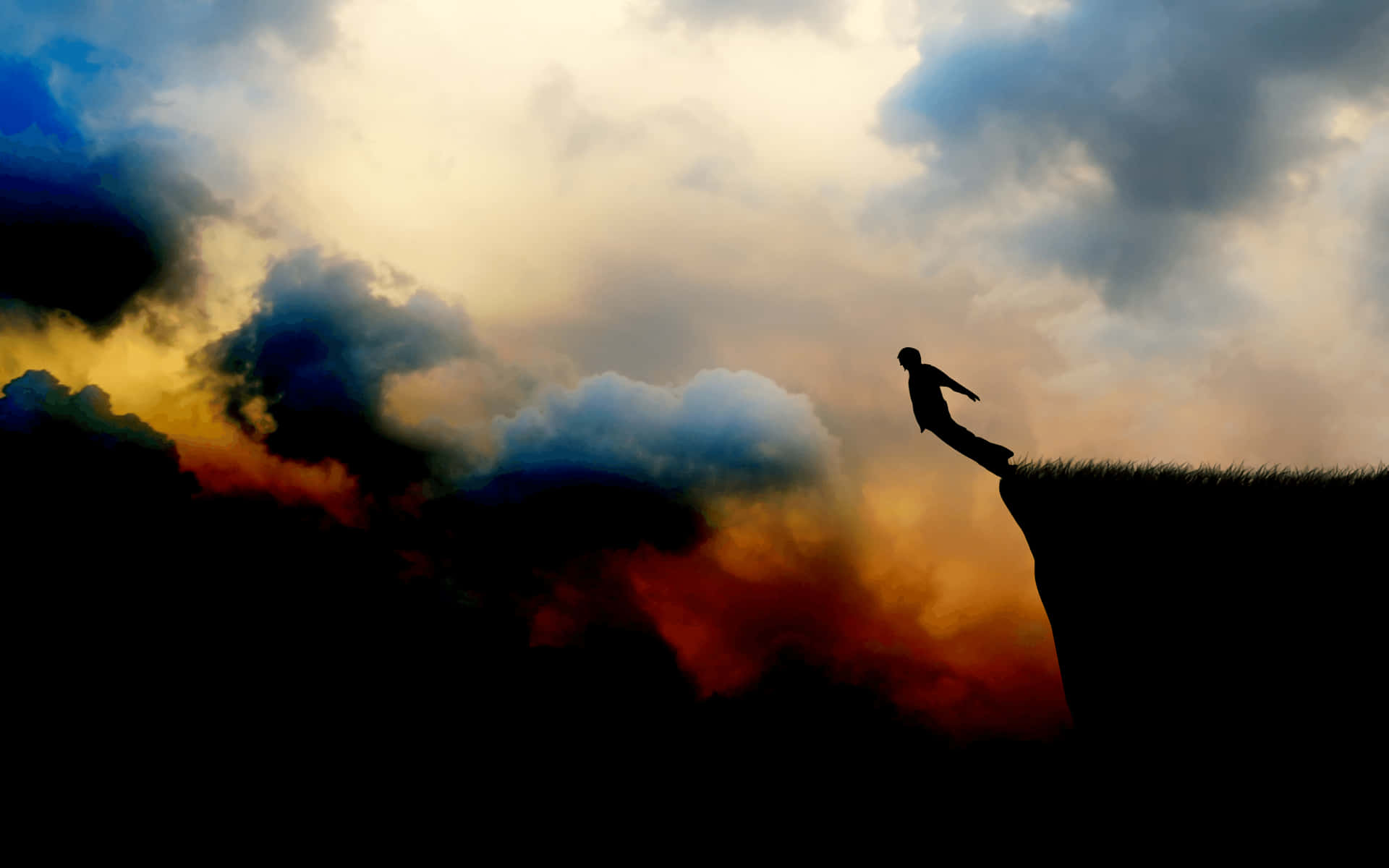 Einmann Steht Auf Einer Klippe Mit Wolken Im Hintergrund. Wallpaper