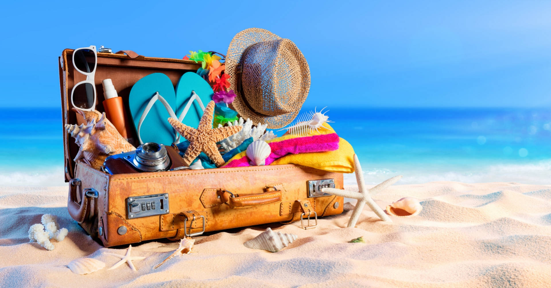 Suitcase For Beach Vacation Wallpaper