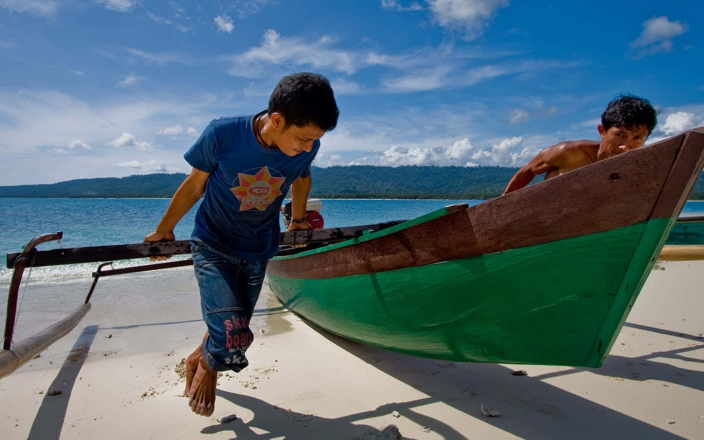 Sulawesi Fishermen Pulling Their Boat Wallpaper