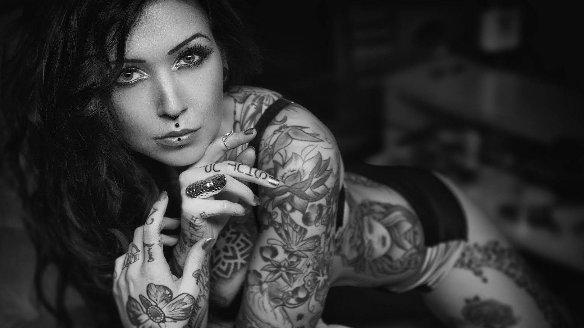 Sultry Woman With Tattoo