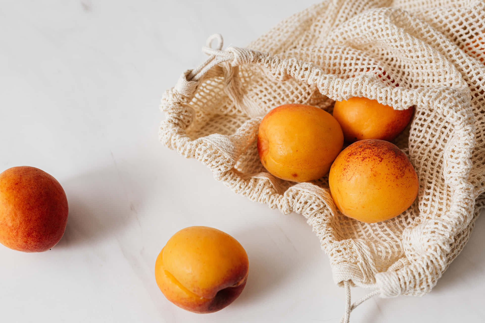 Vibrant Summer Fruits Feast on a Wooden Table Wallpaper